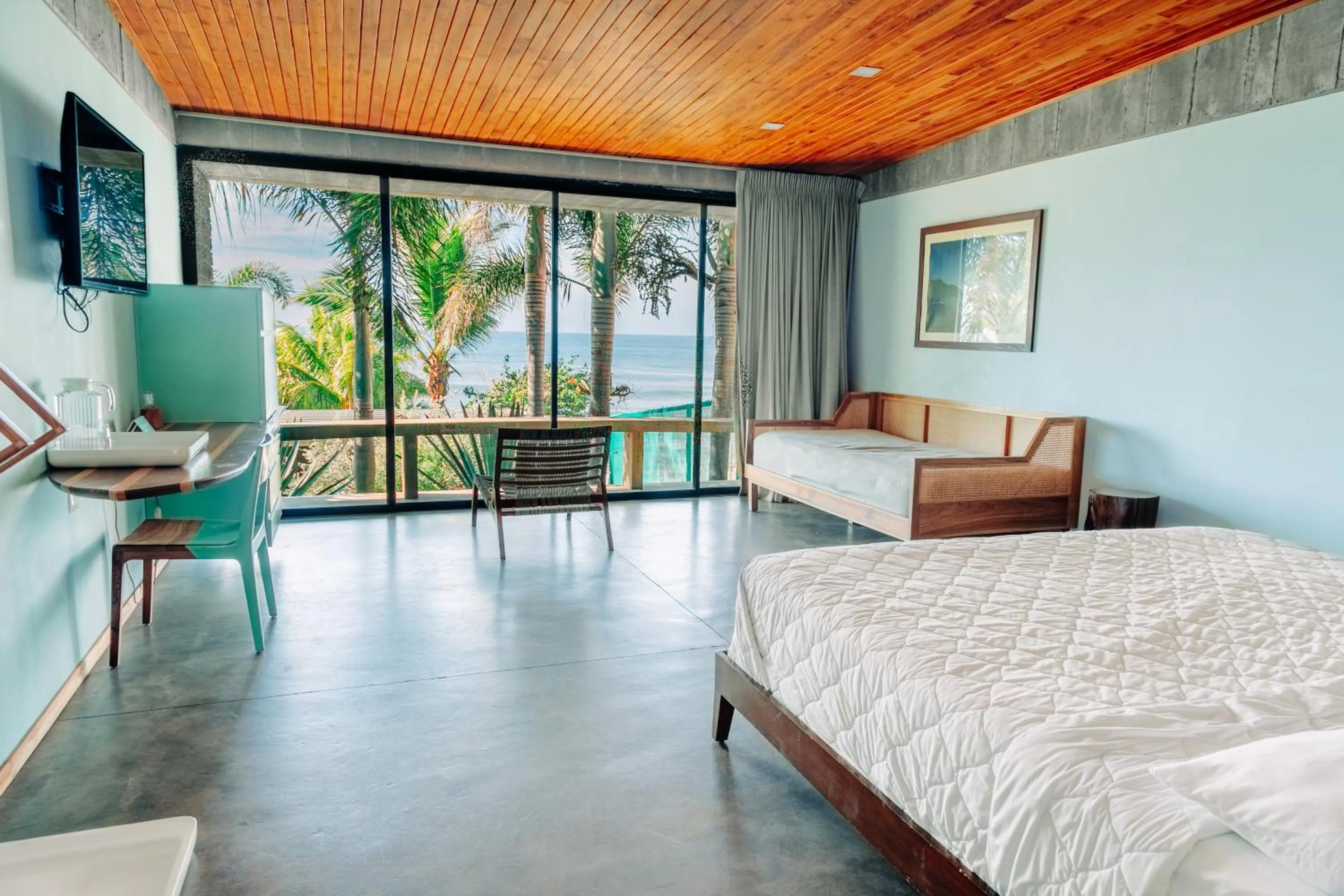 Bed in Puro Surf Hotel & Performance Academy