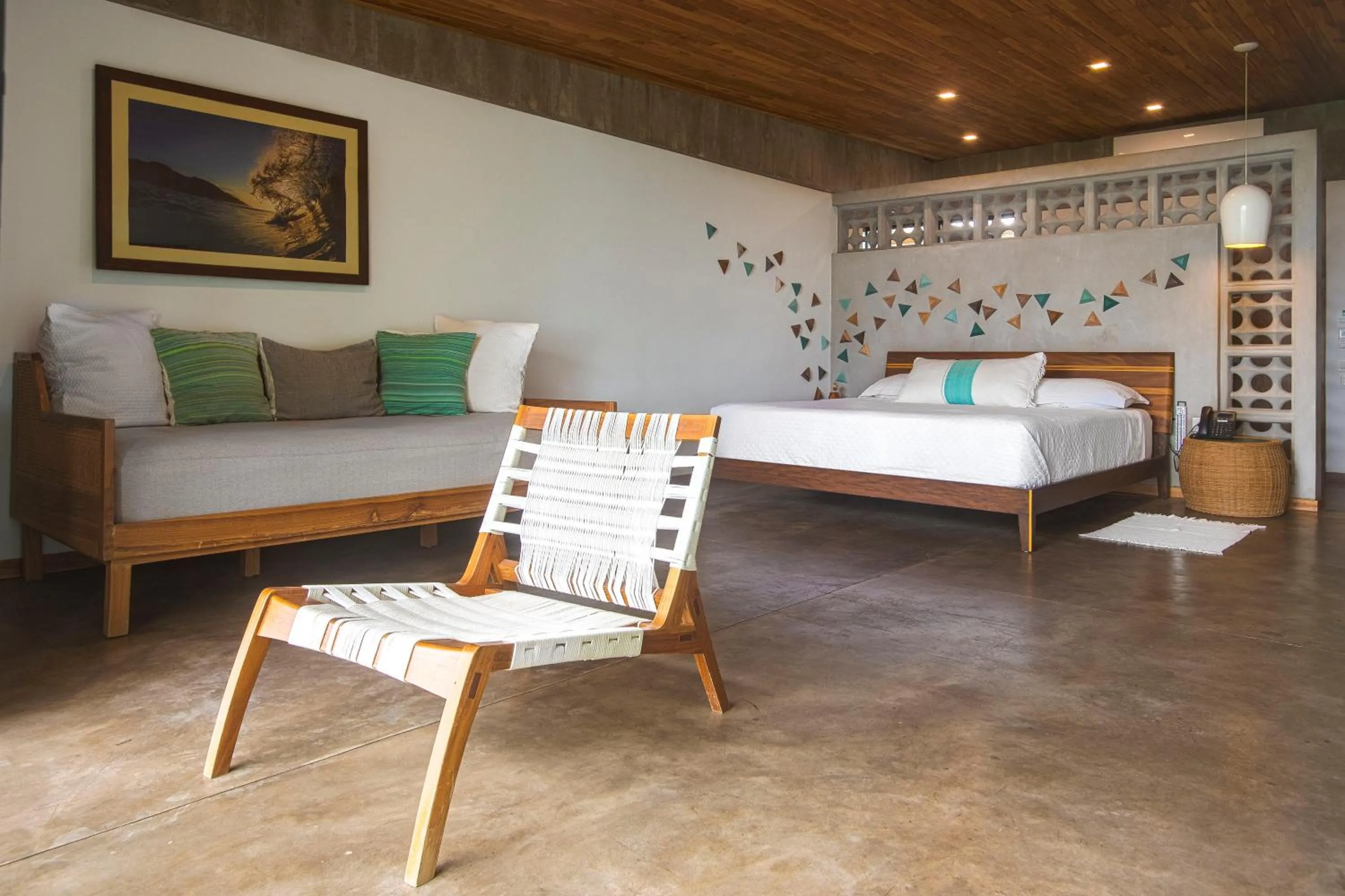 Bed in Puro Surf Hotel & Performance Academy