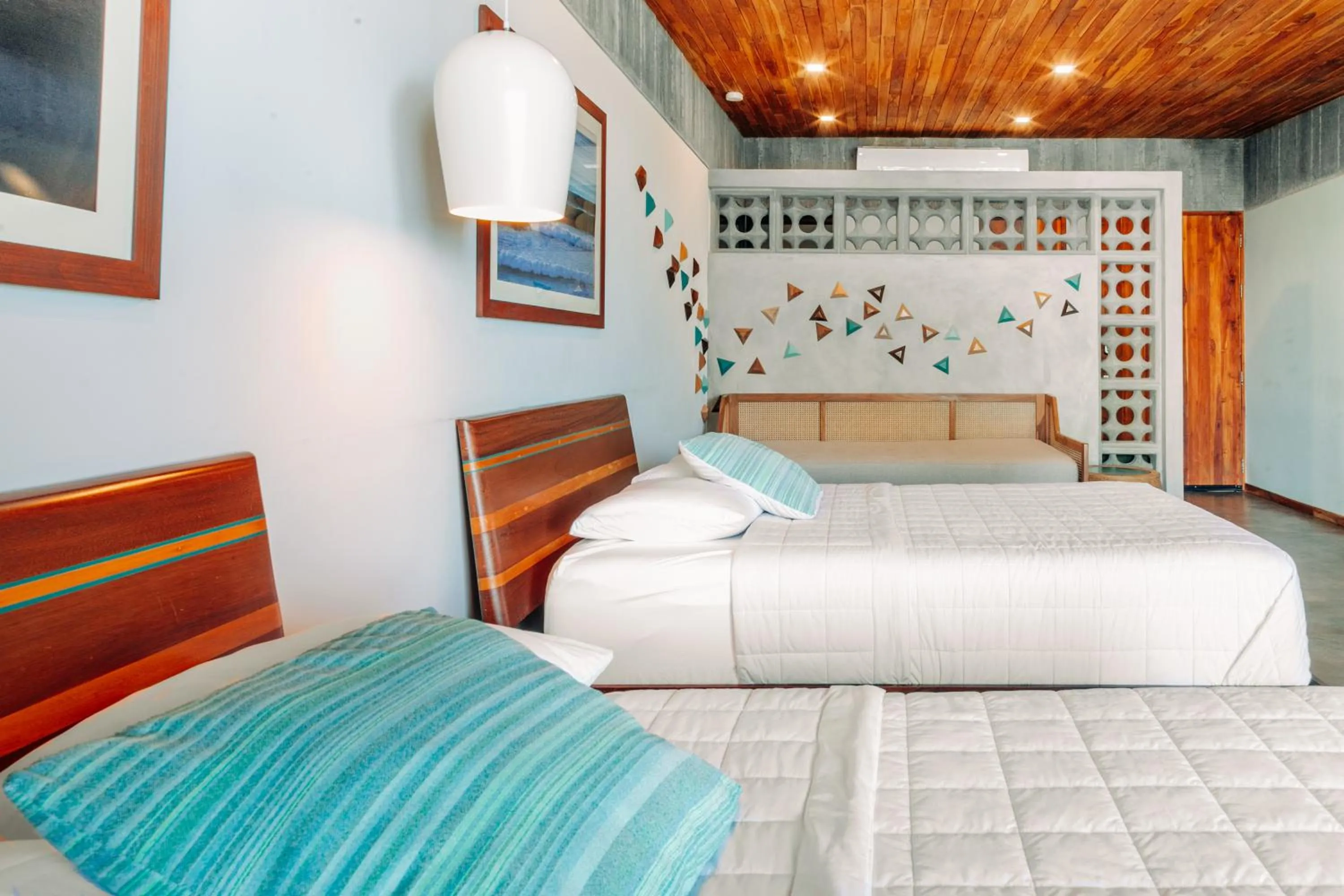 Bed in Puro Surf Hotel & Performance Academy