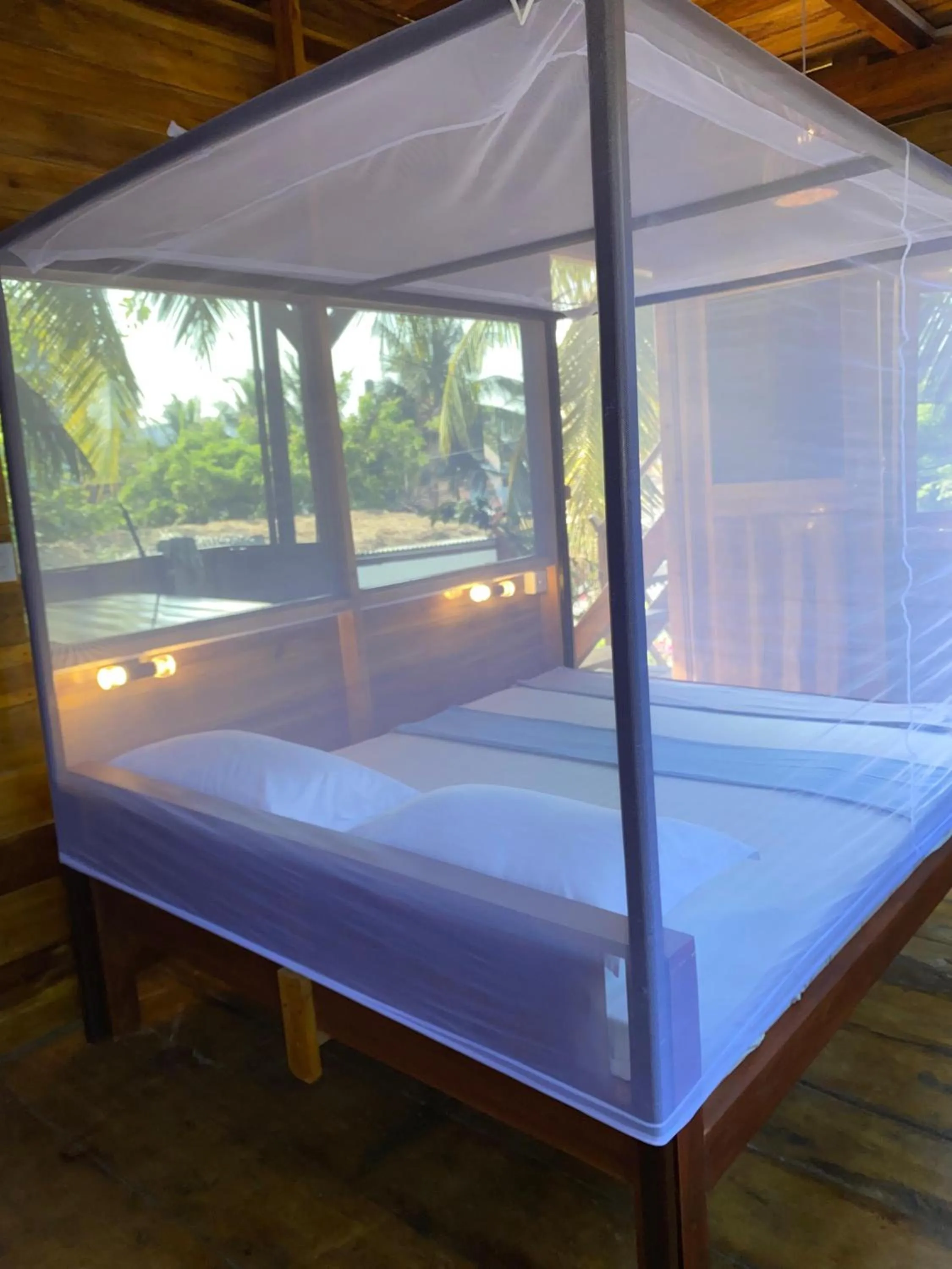 Bed in Surf Beach Hotel