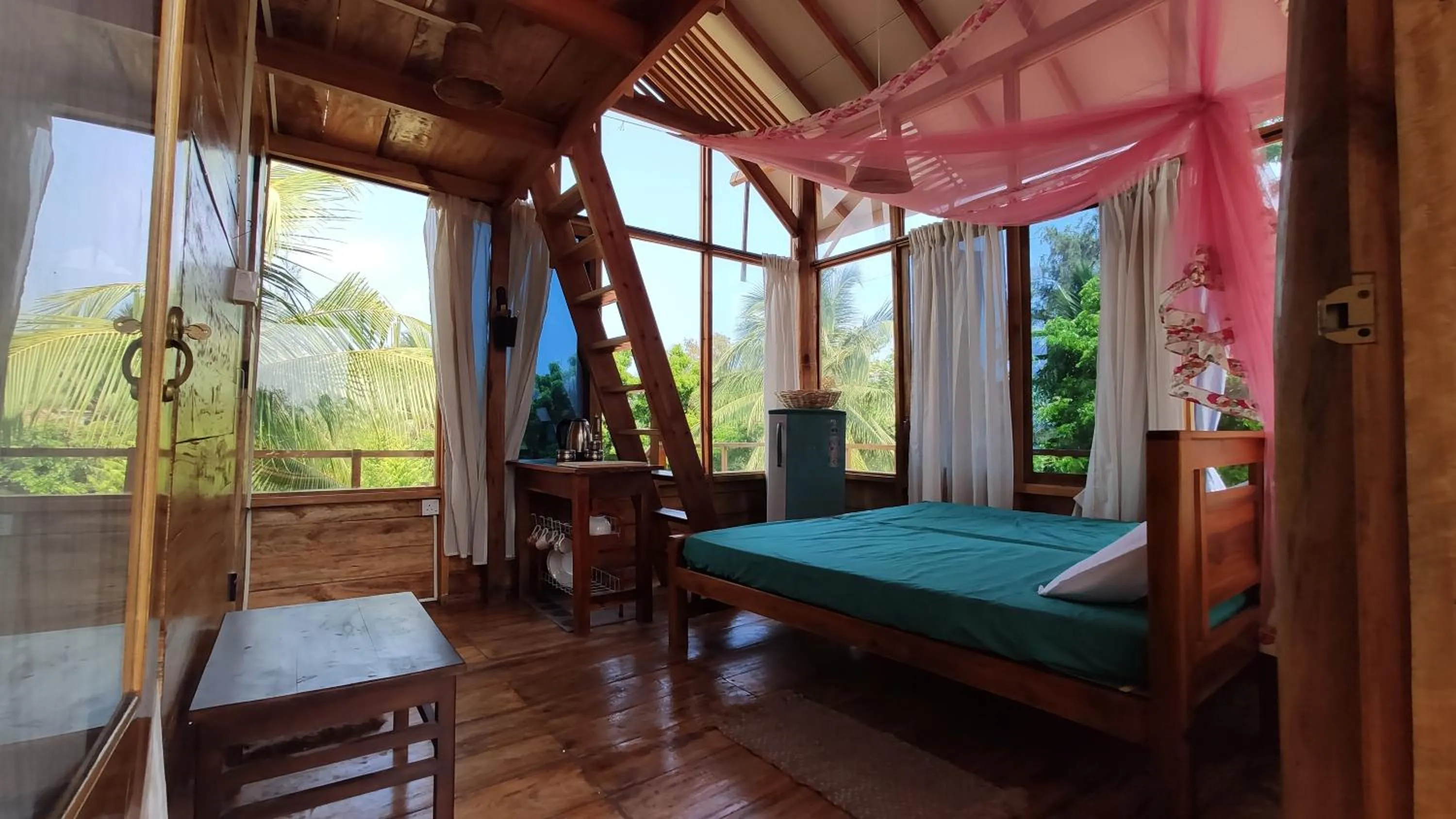 Bed in Surf Beach Hotel