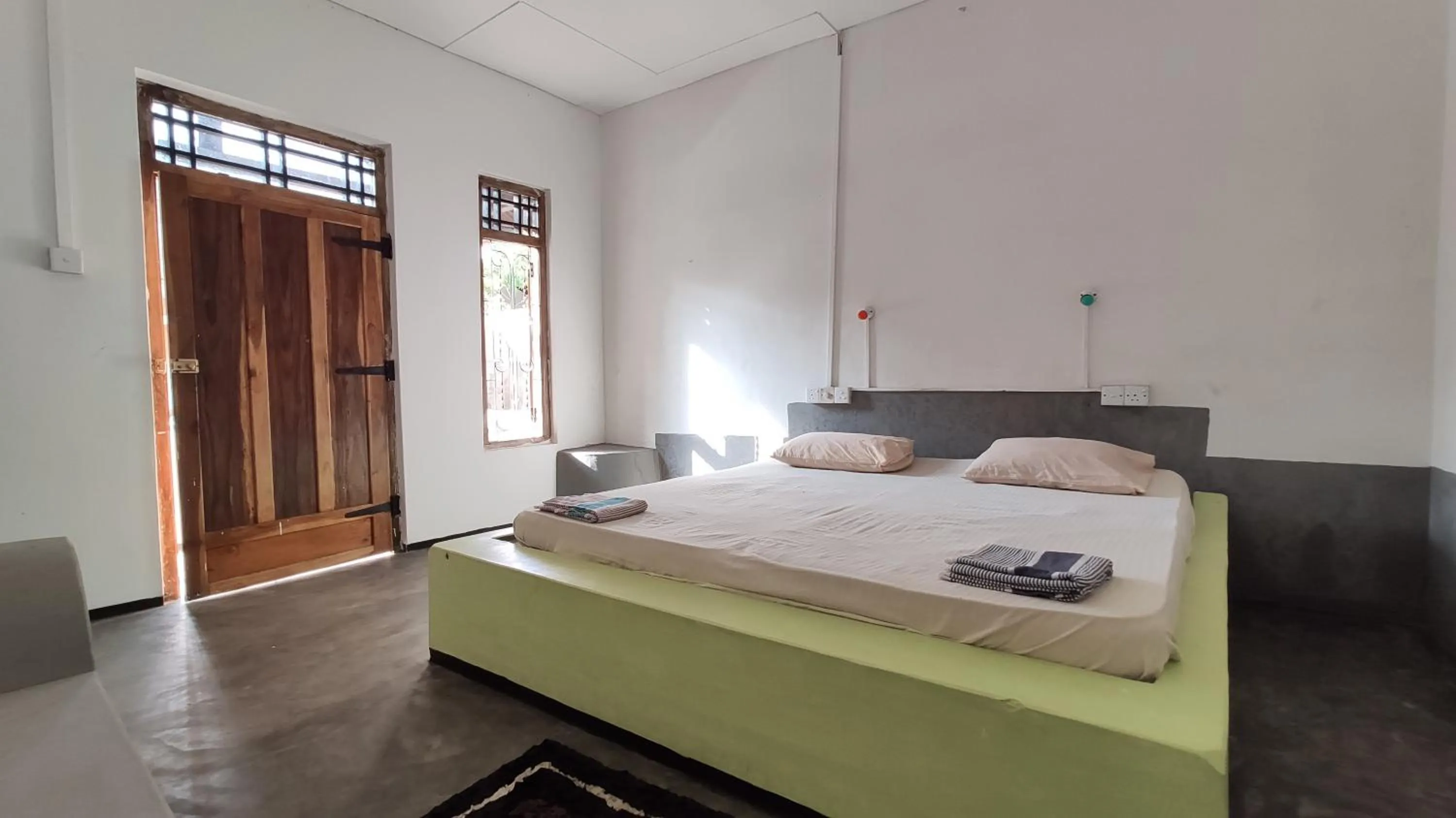 Bed in Surf Beach Hotel