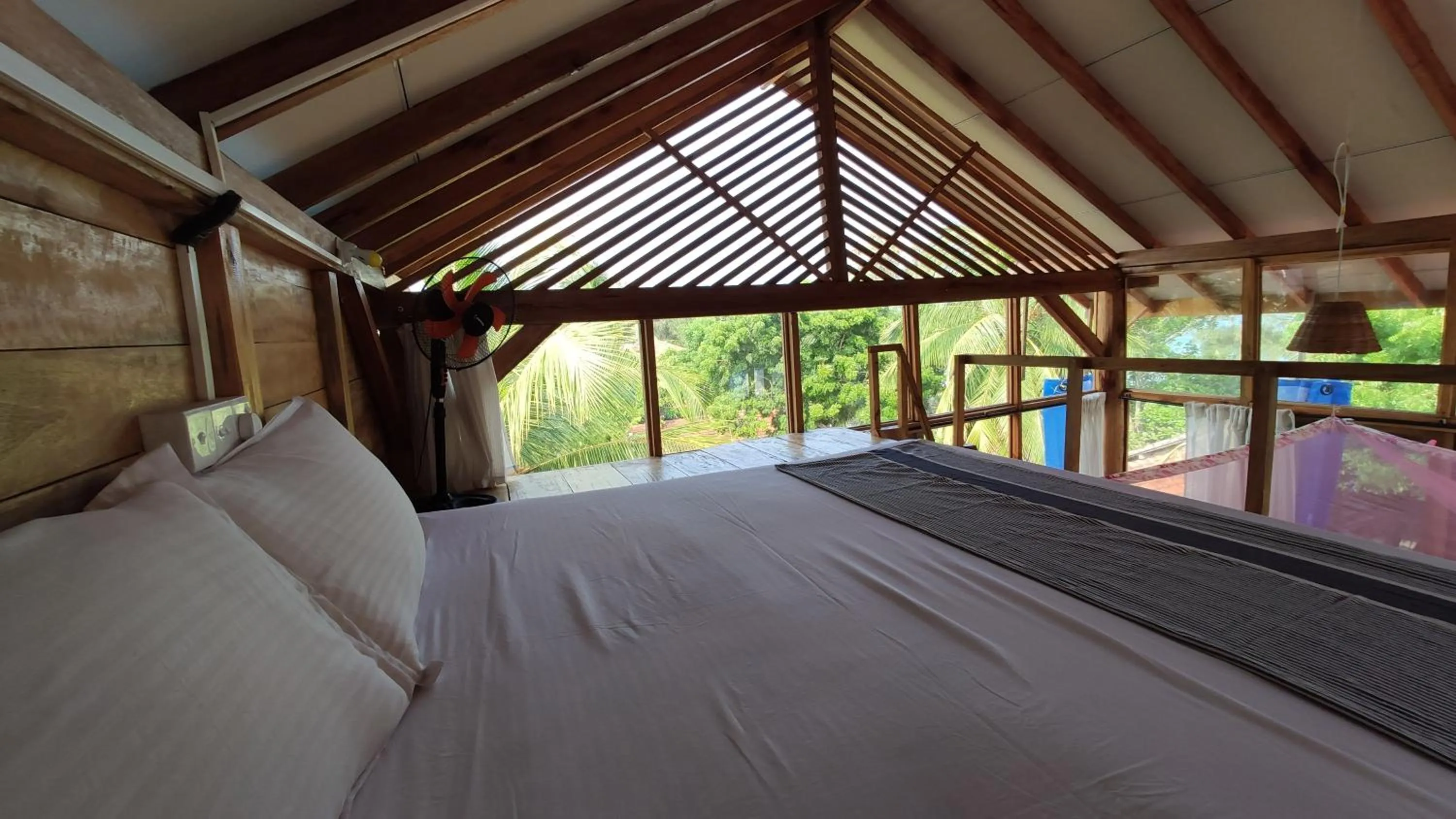 Bed in Surf Beach Hotel