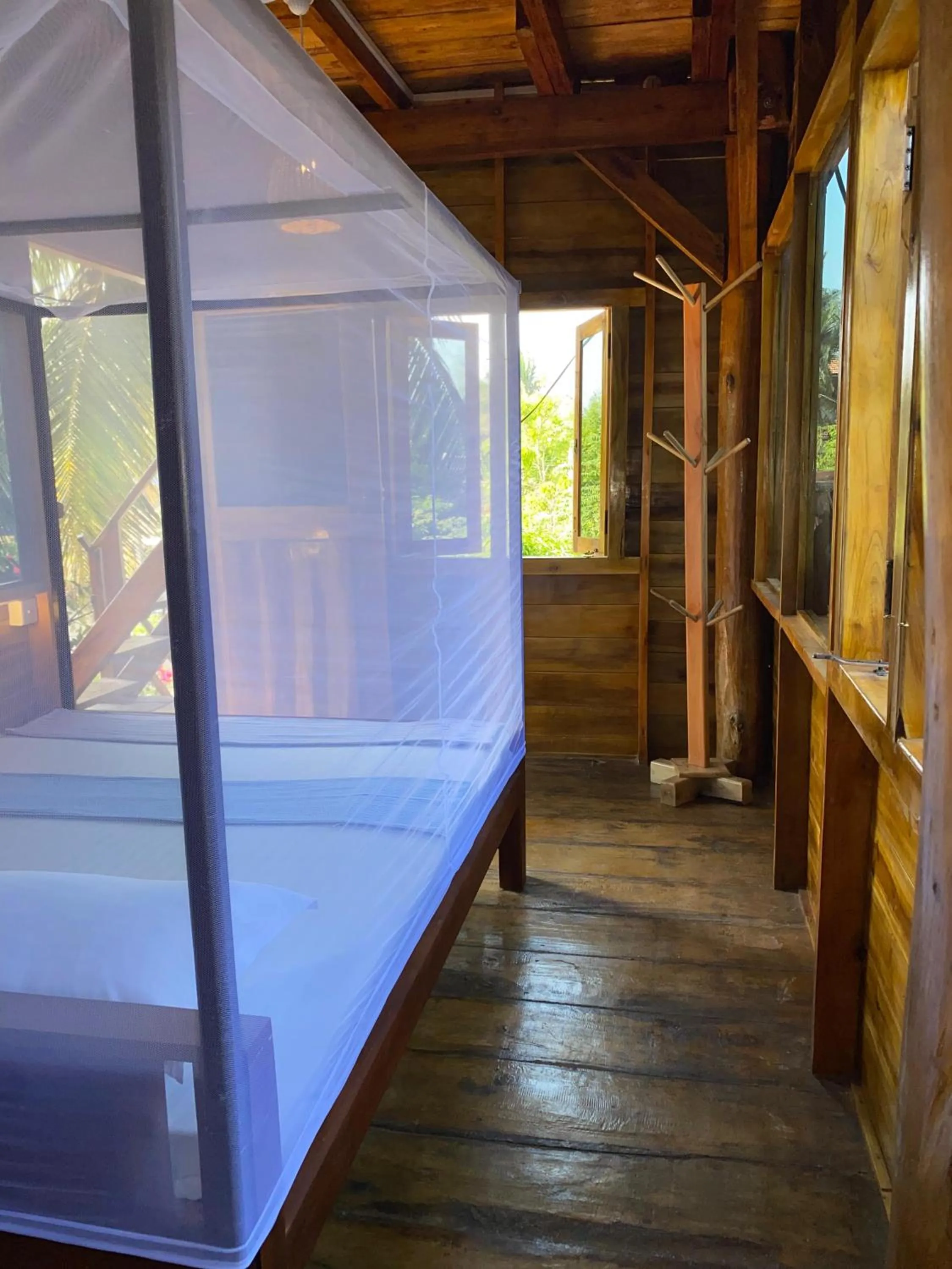 Bed in Surf Beach Hotel