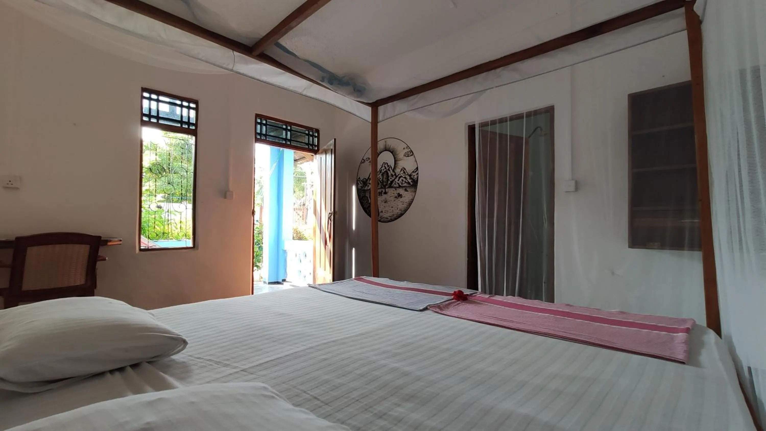 Bed in Surf Beach Hotel