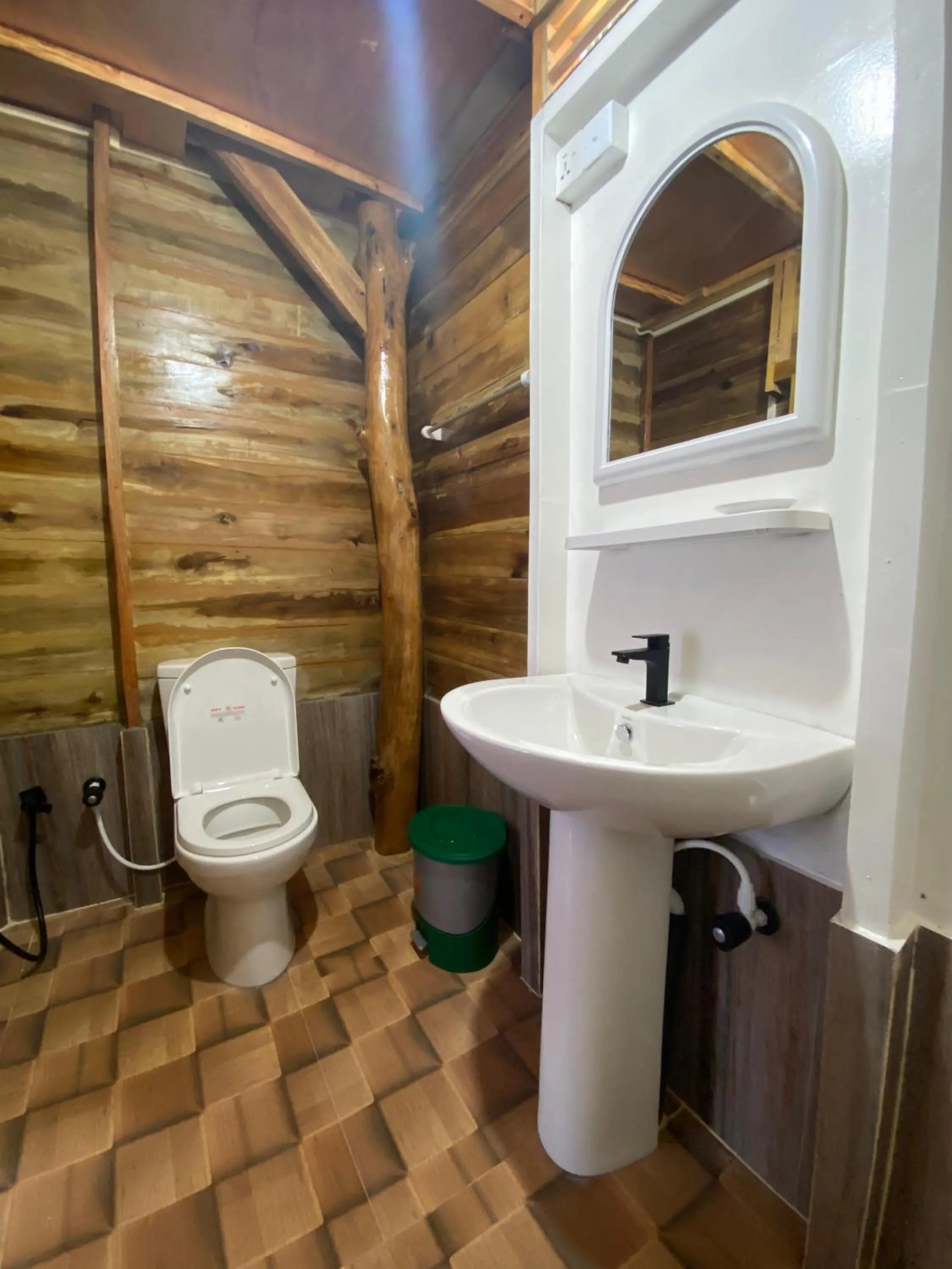 Toilet in Surf Beach Hotel