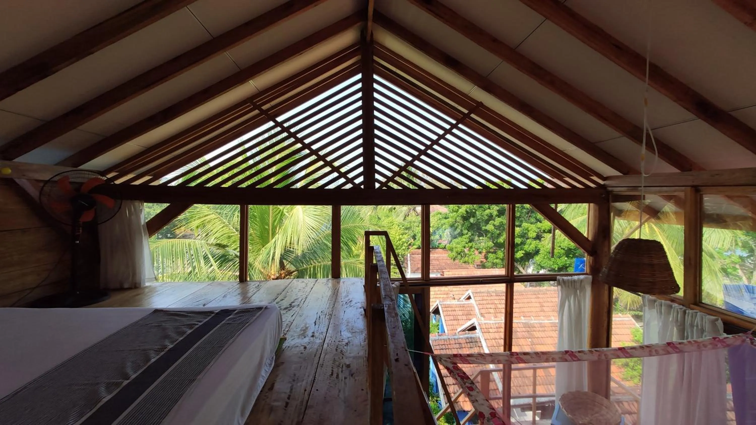 Bed in Surf Beach Hotel