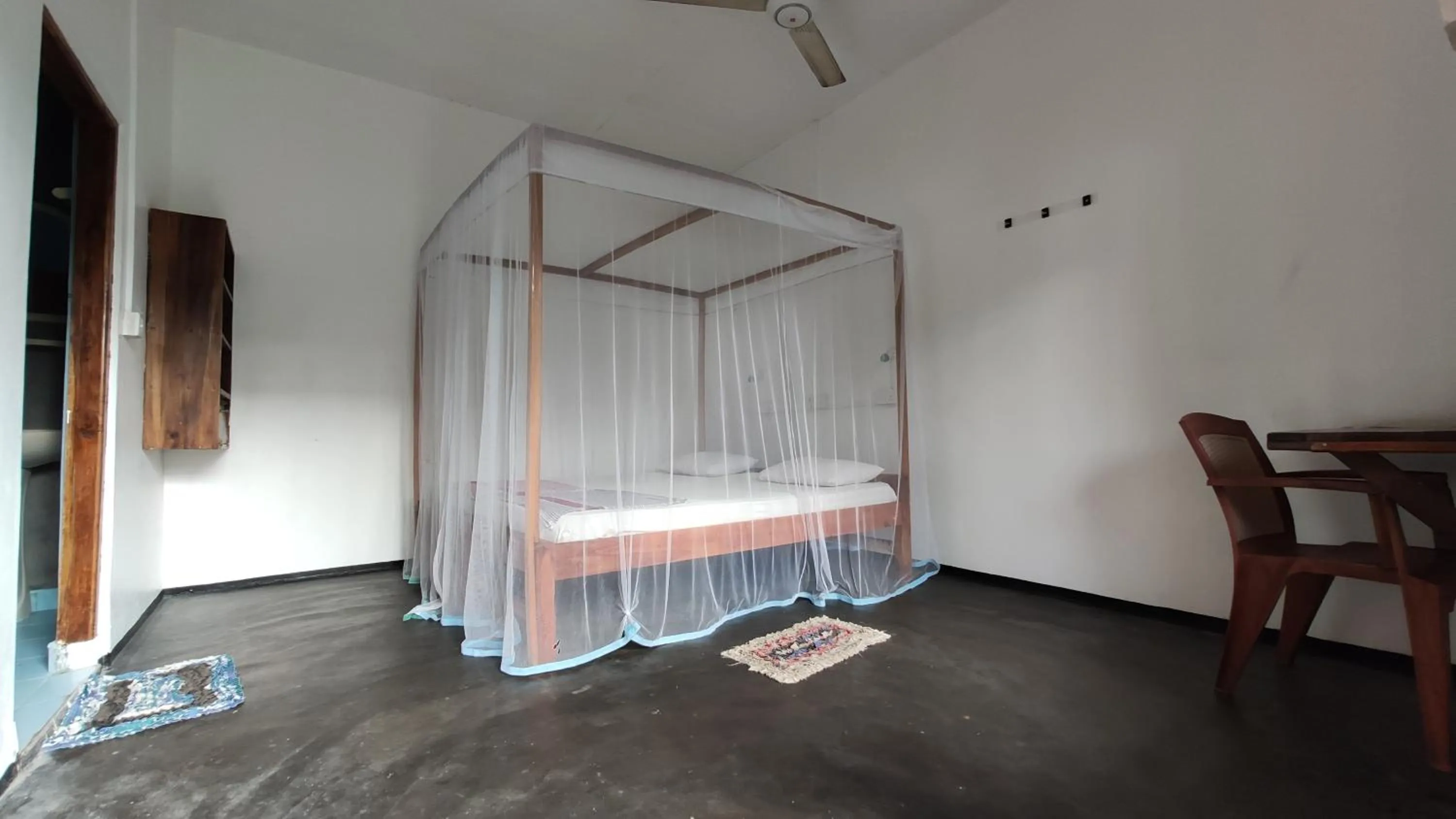 Bed in Surf Beach Hotel