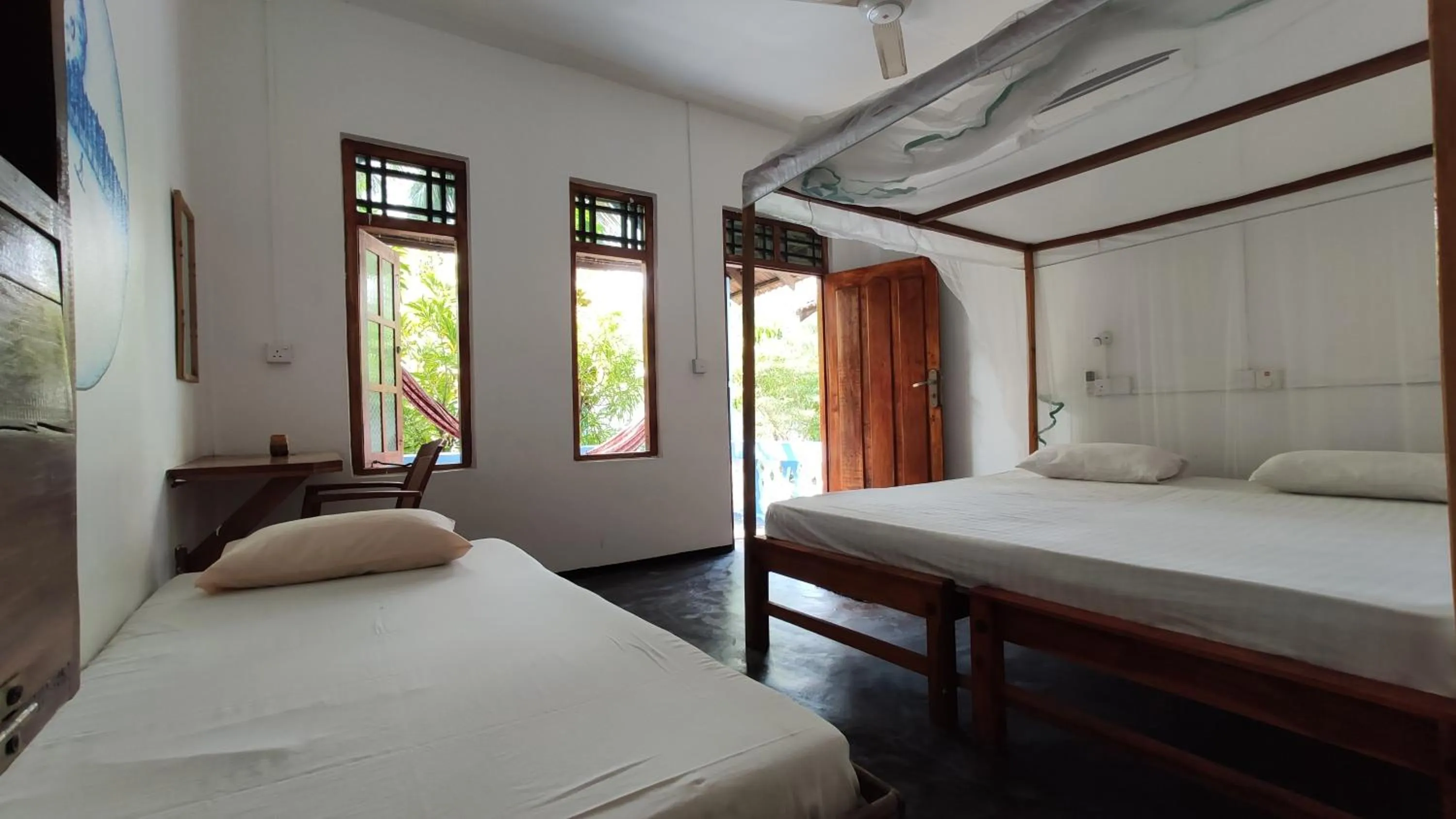 Bed in Surf Beach Hotel