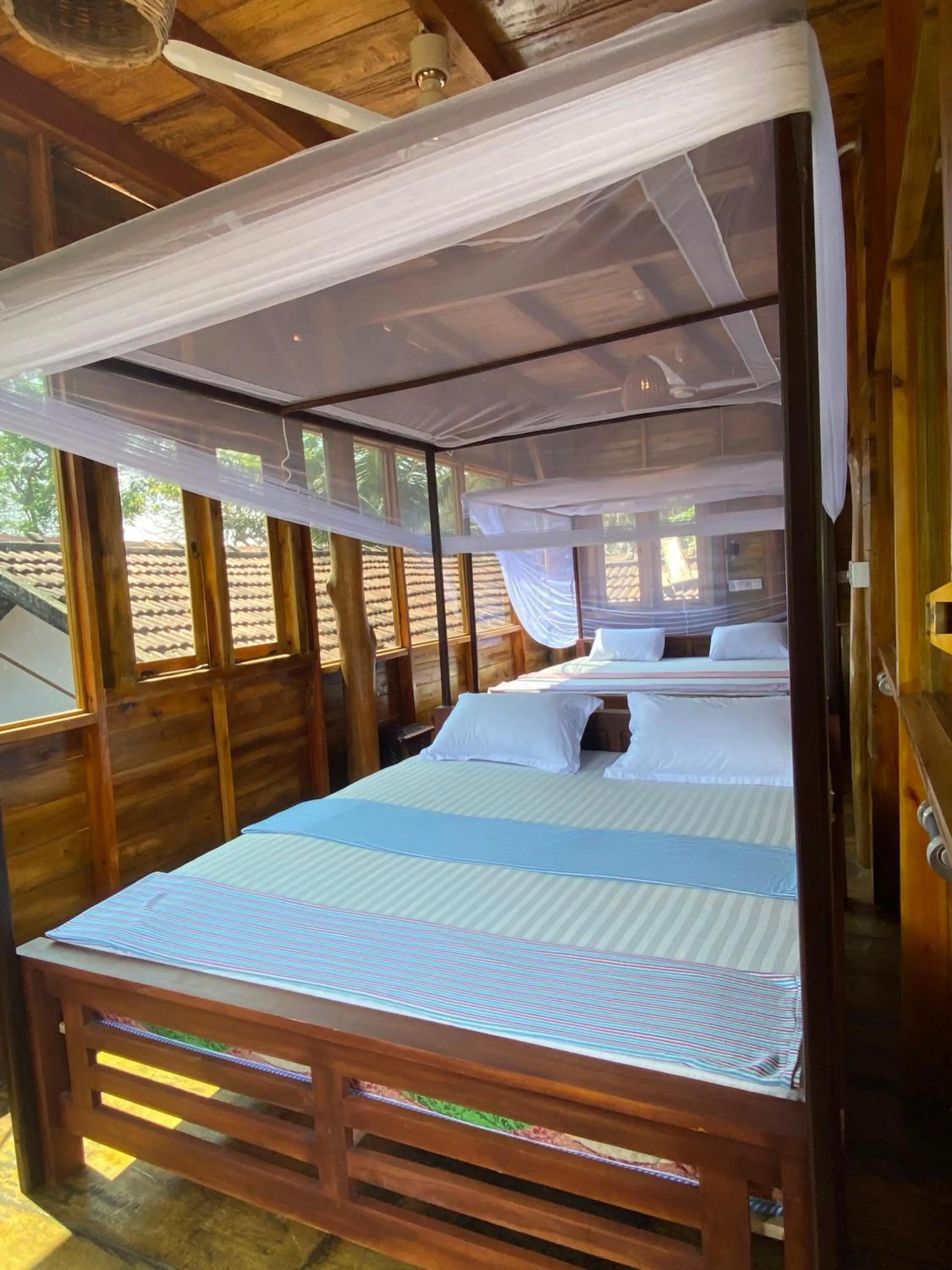 Bed in Surf Beach Hotel