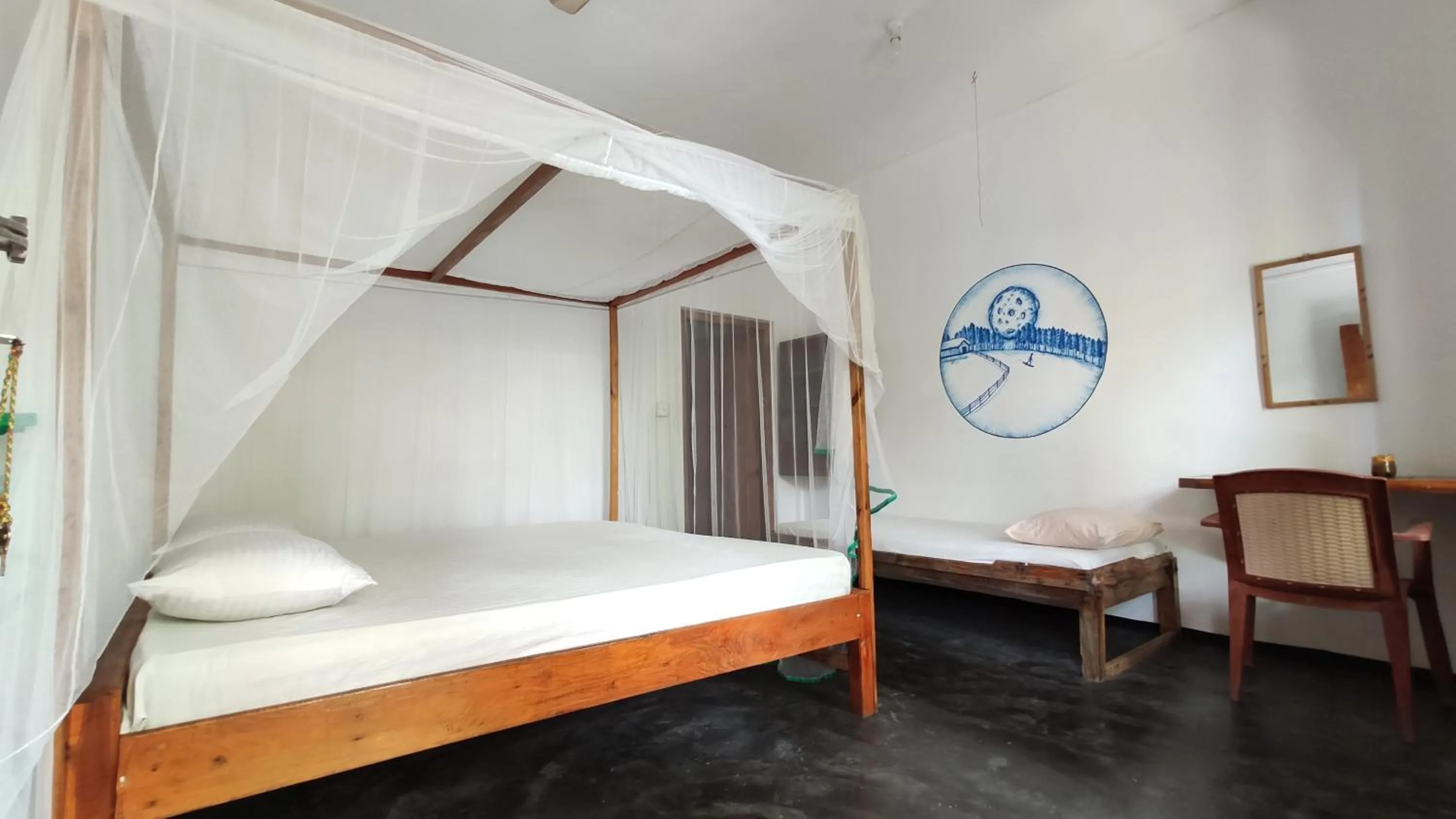 Bed in Surf Beach Hotel