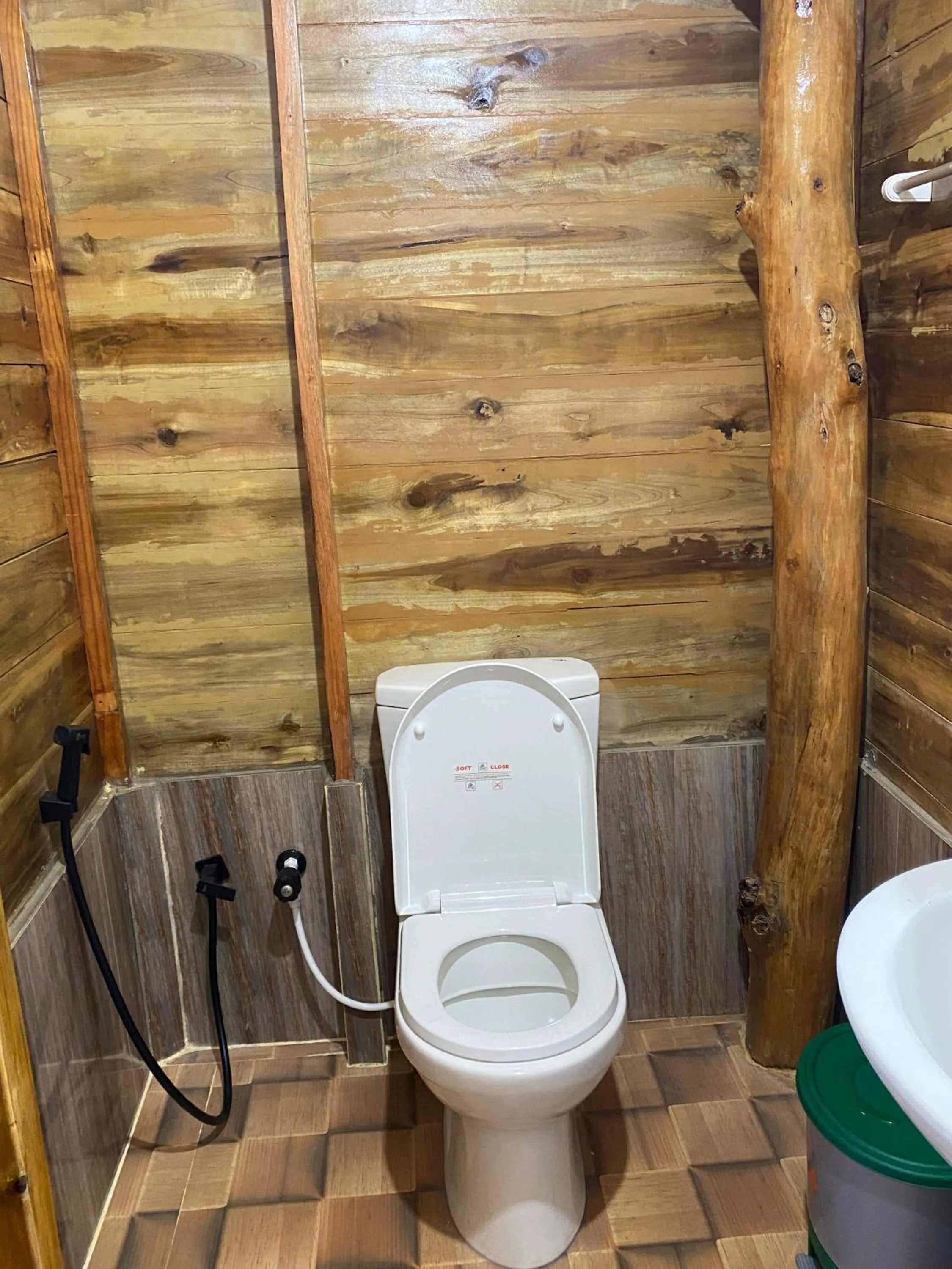 Toilet in Surf Beach Hotel