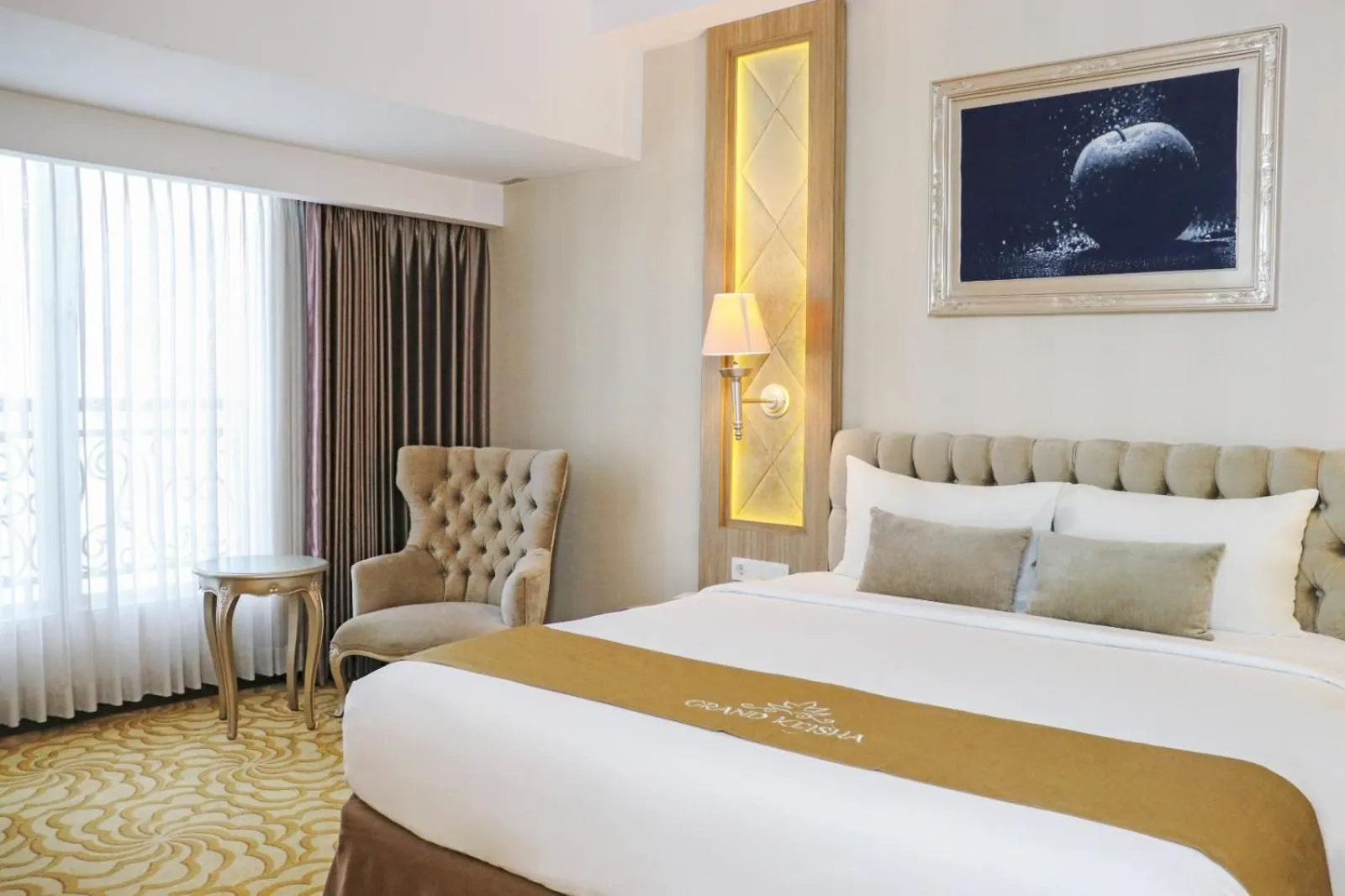 Bed in Grand Keisha Yogyakarta