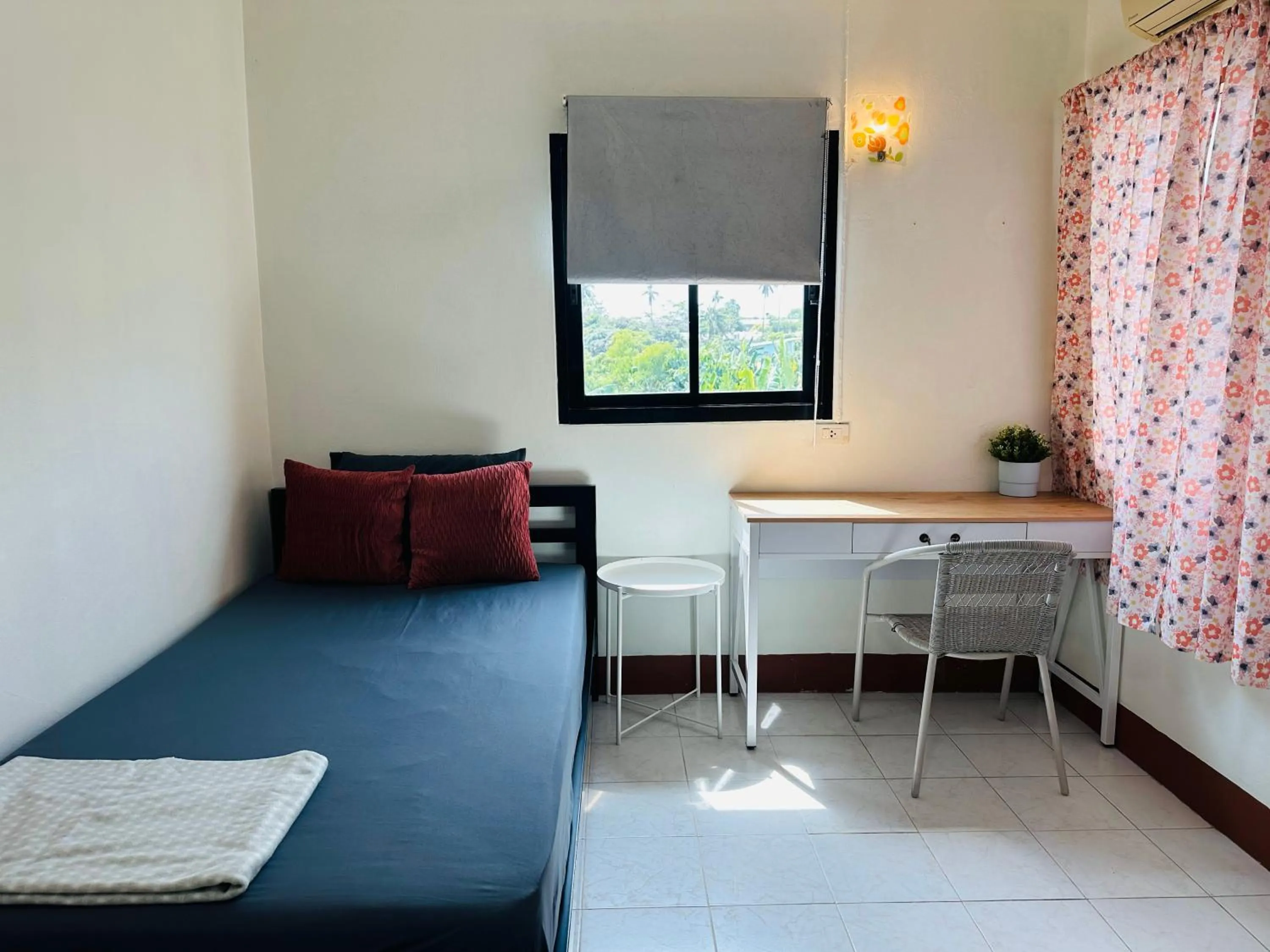 Bed in K.L.Apartment