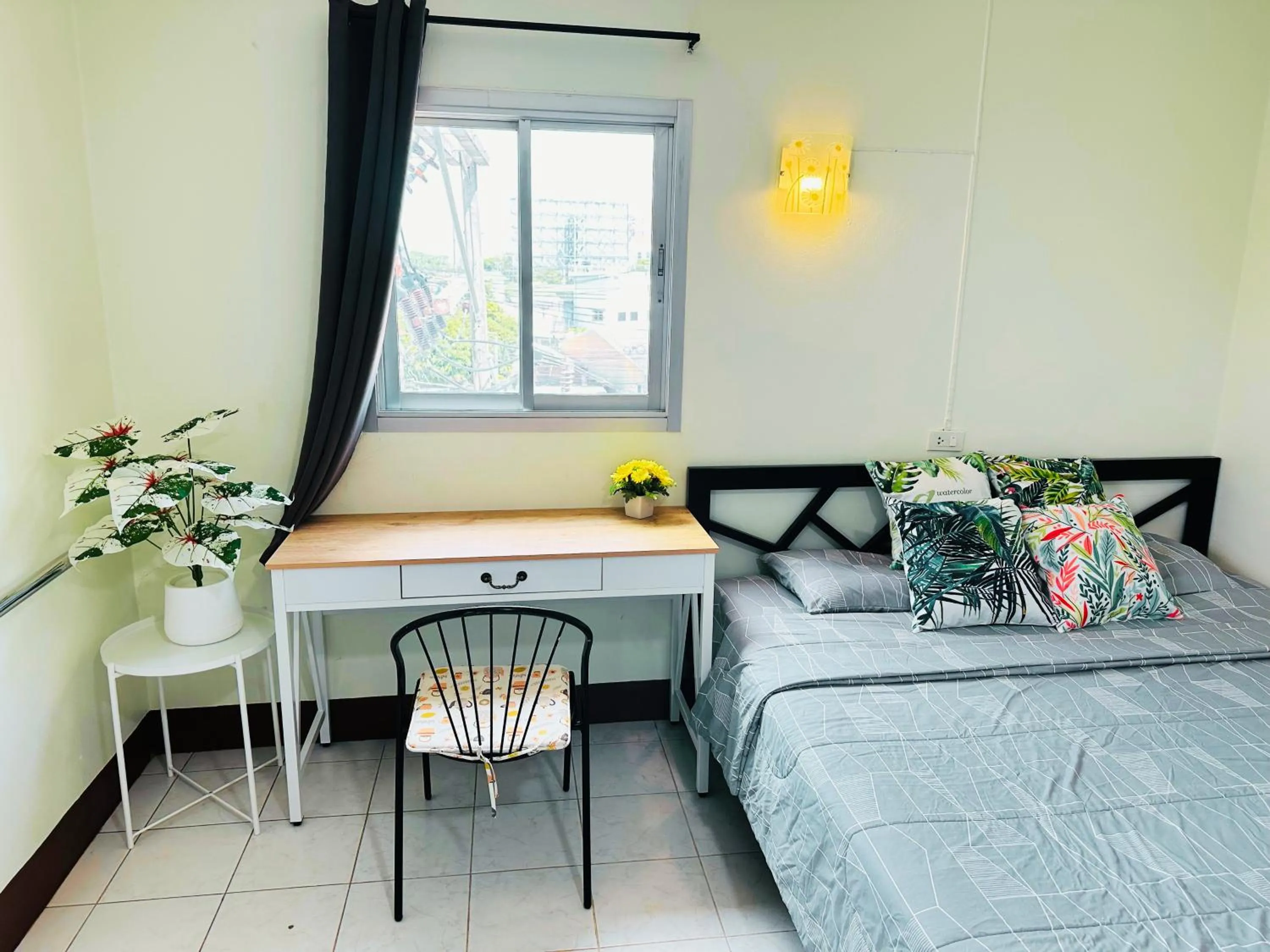 Bed in K.L.Apartment