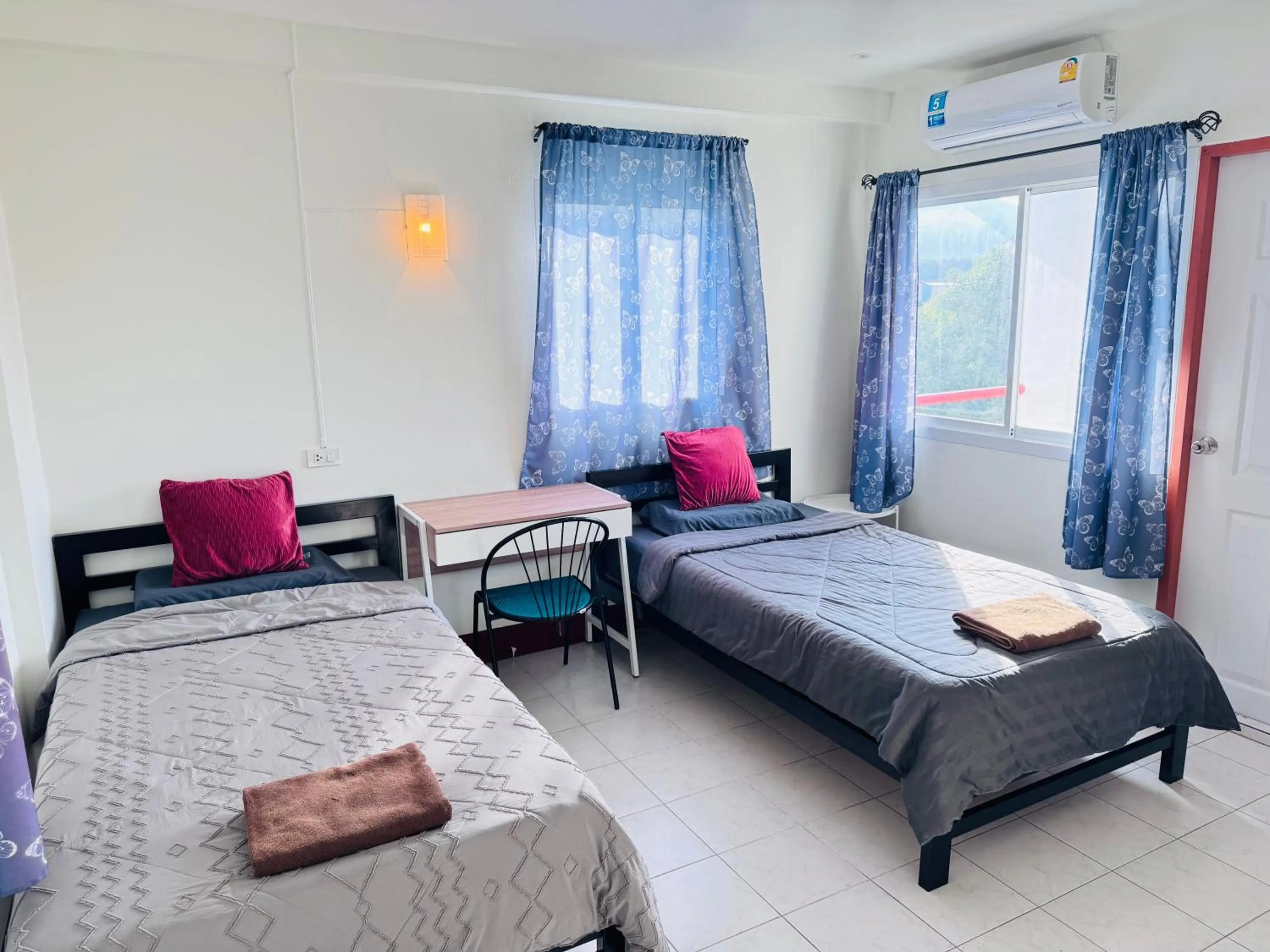 Bed in K.L.Apartment