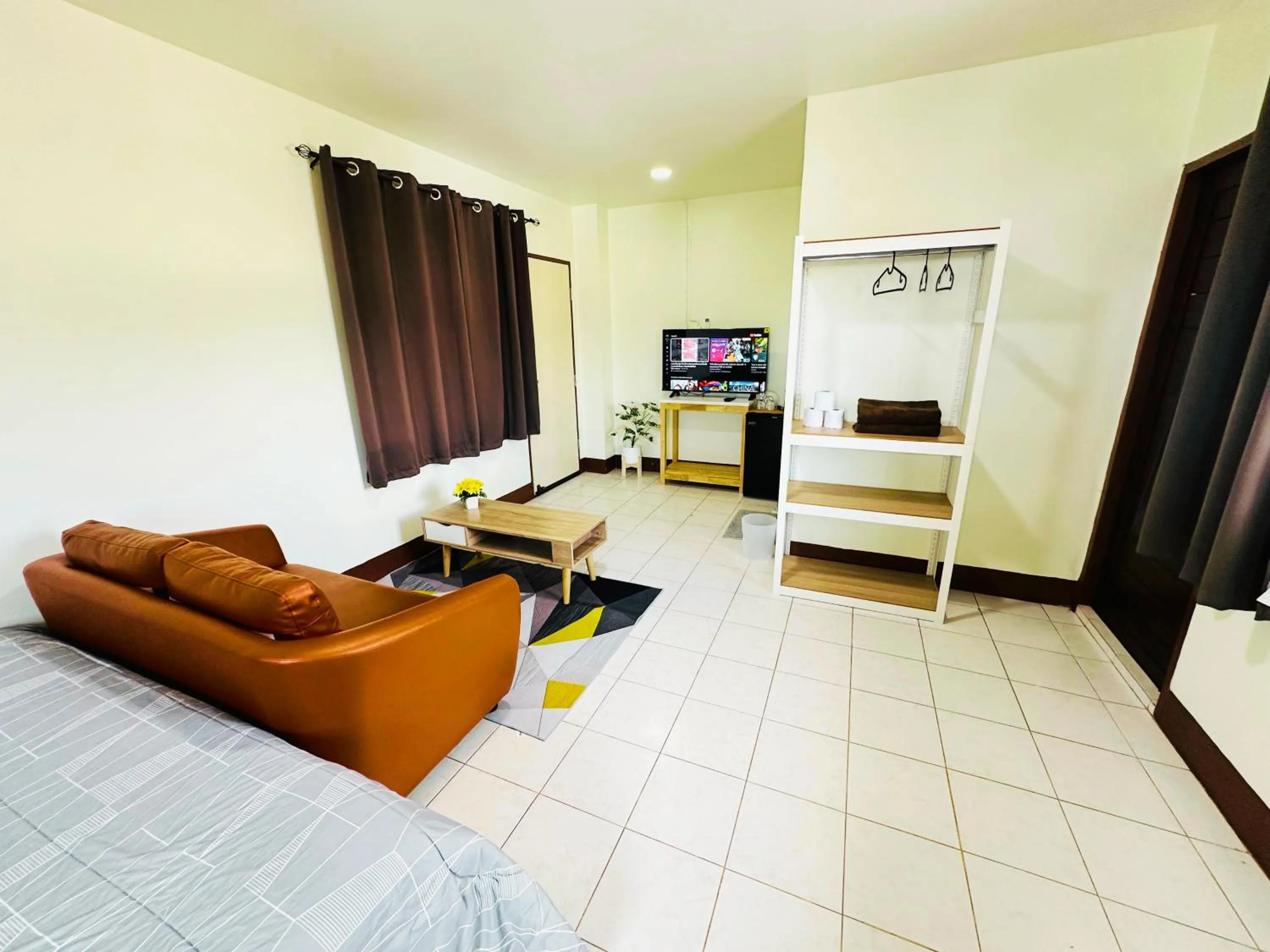 Bed in K.L.Apartment