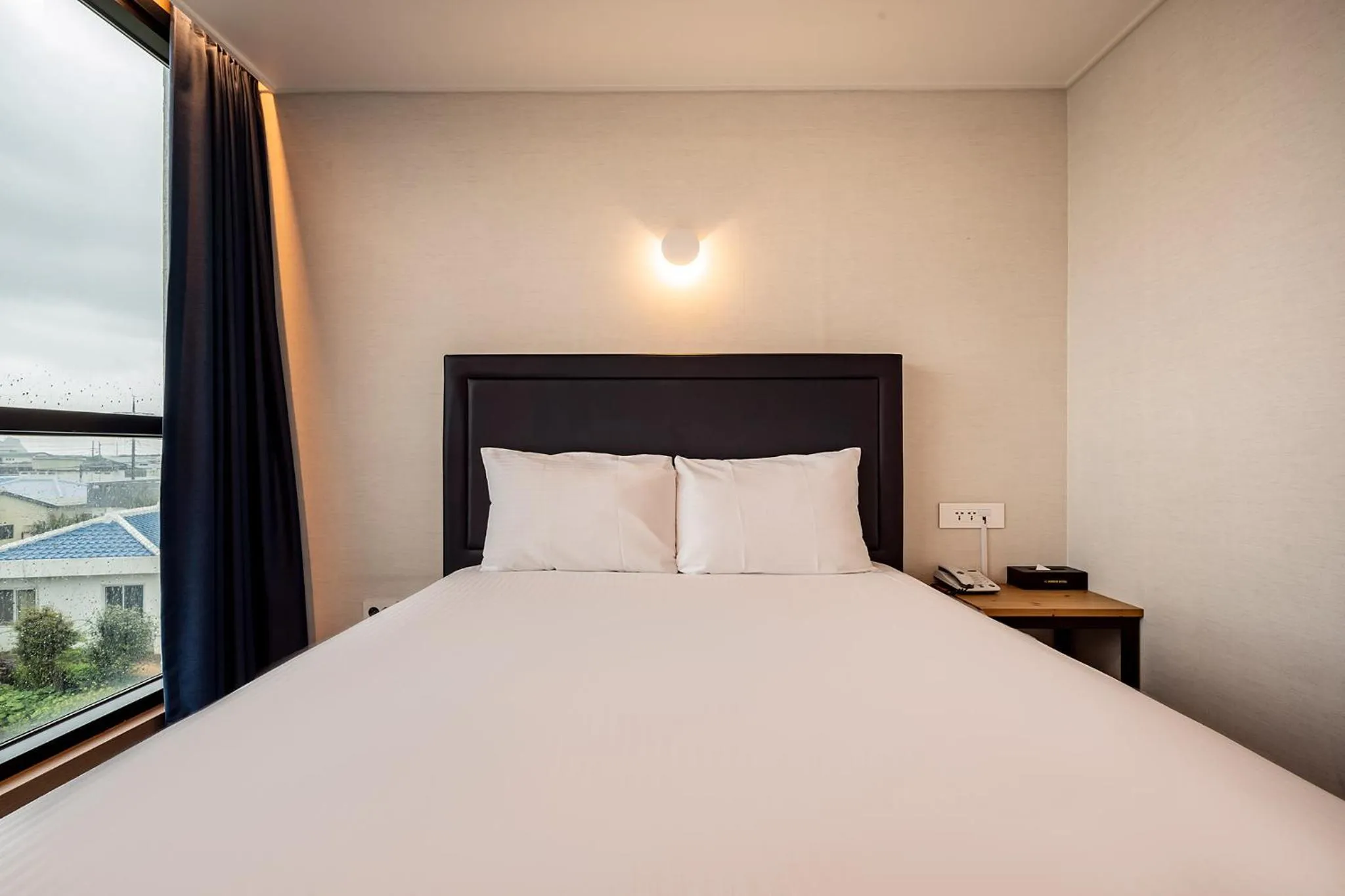 Bed in Sunrise Hotel Supjikoji