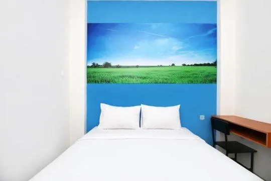 Bedroom, Bed in RedDoorz Plus Syariah at Polamas Andalas
