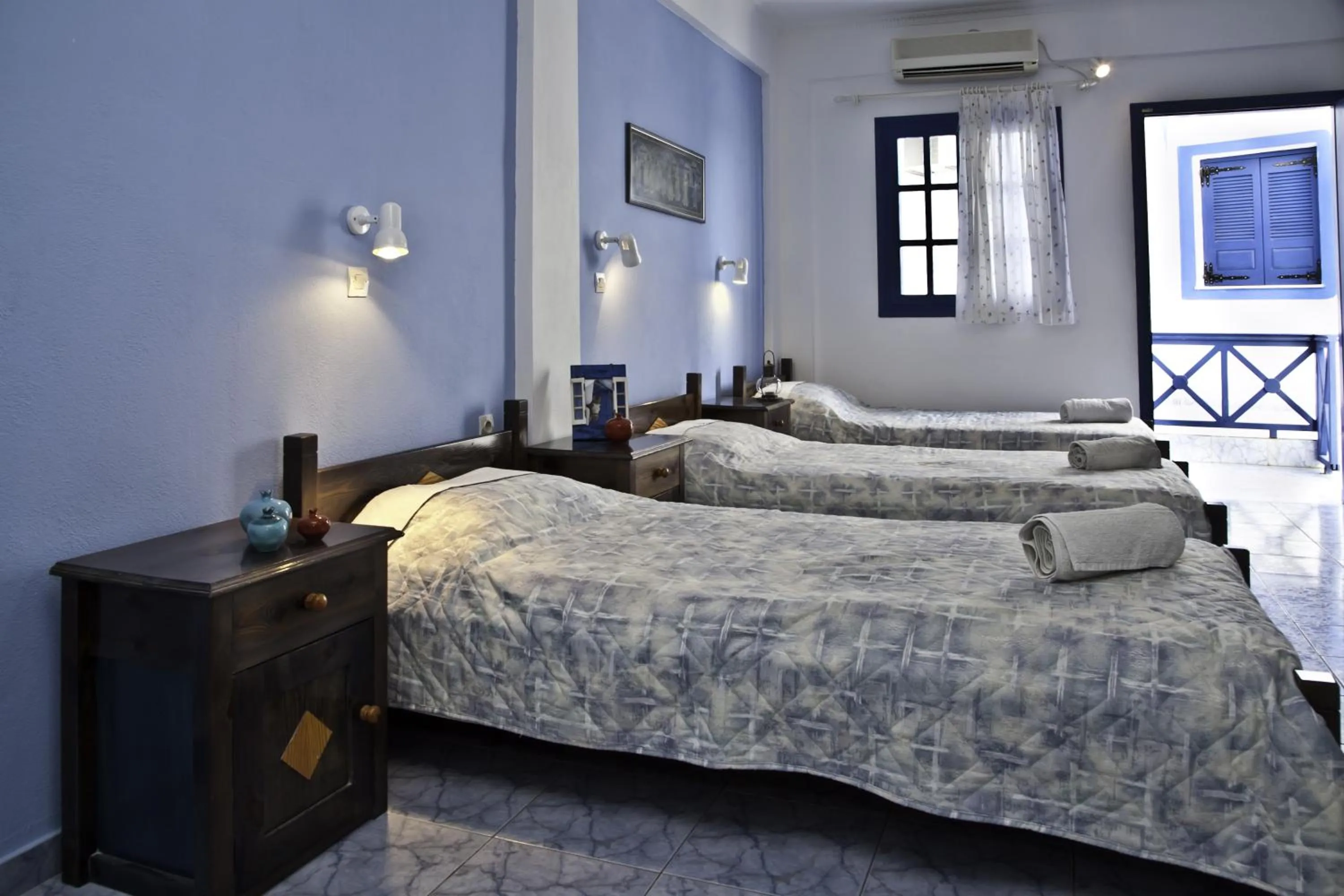Bed in Roula Villa Studios & Apartments