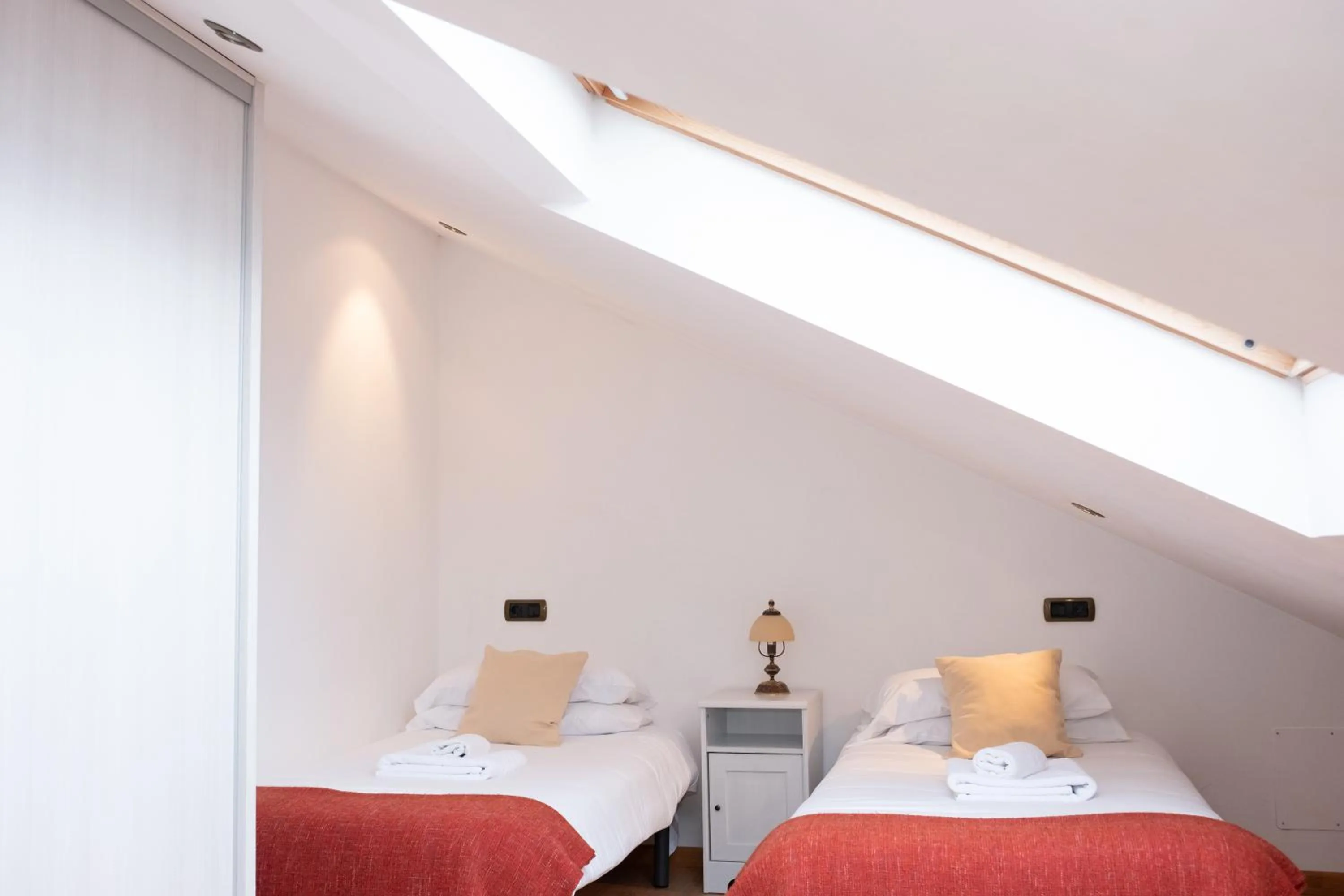 Bed in Apartamentos O Almacen