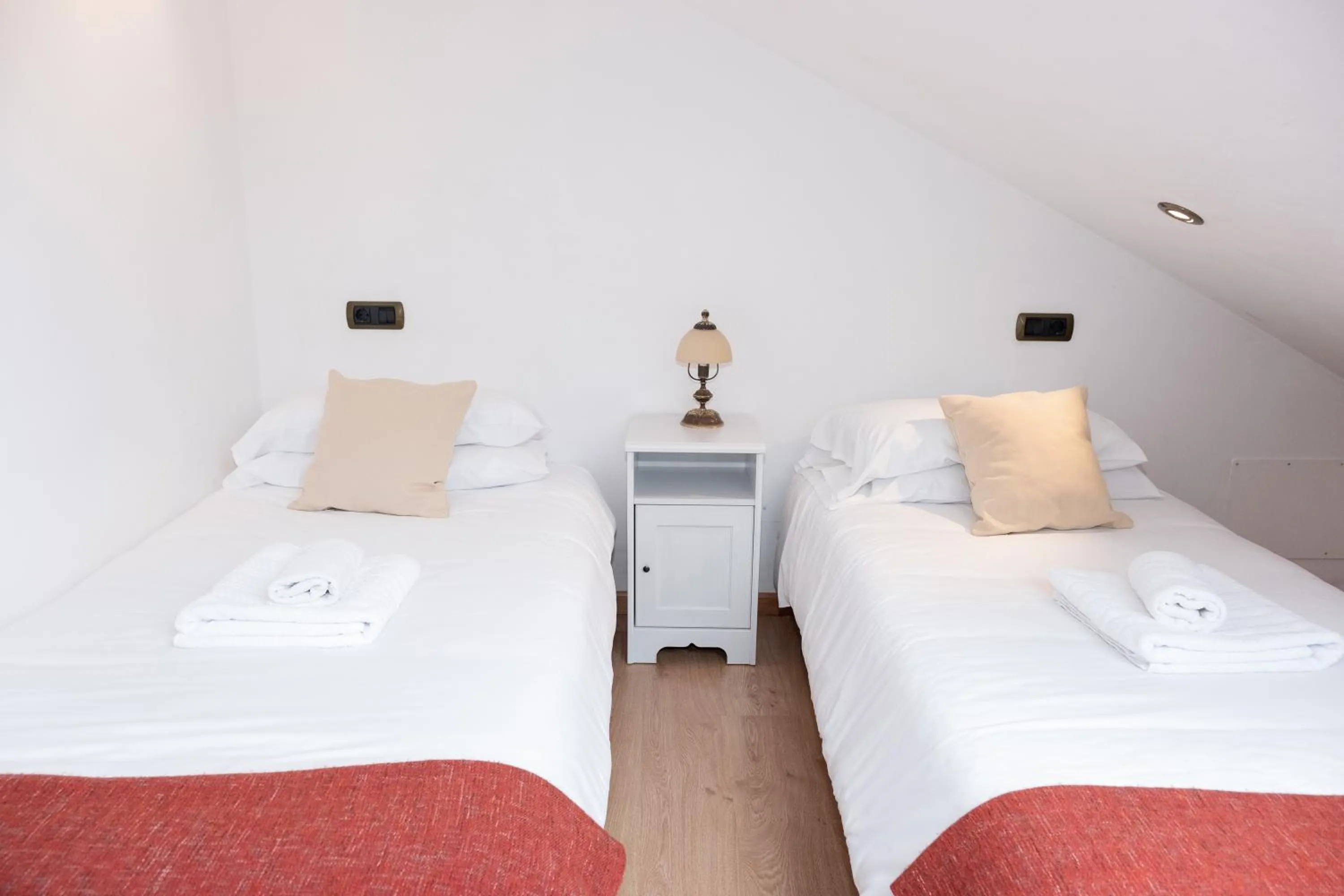 Bed in Apartamentos O Almacen