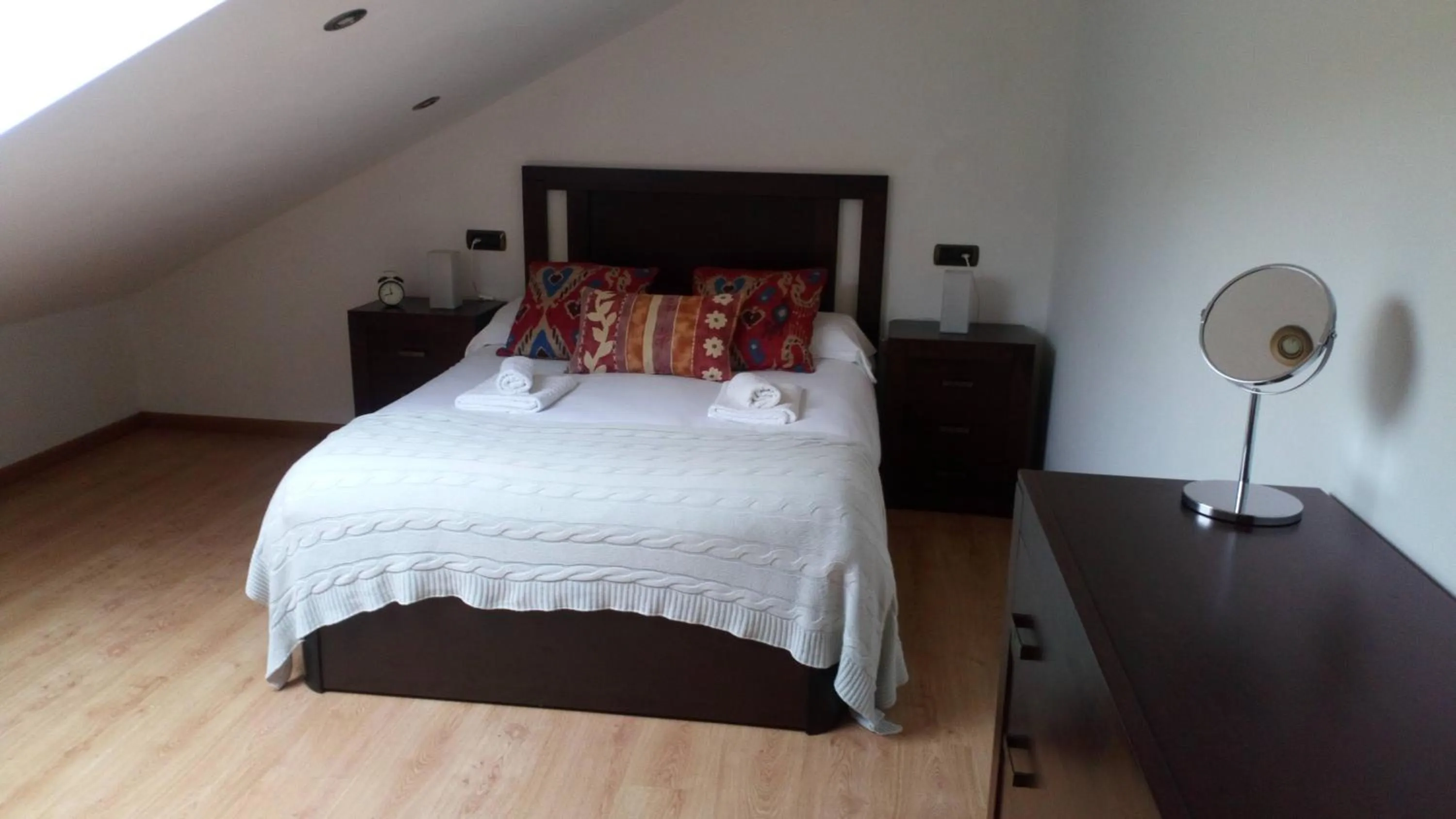 Bed in Apartamentos O Almacen