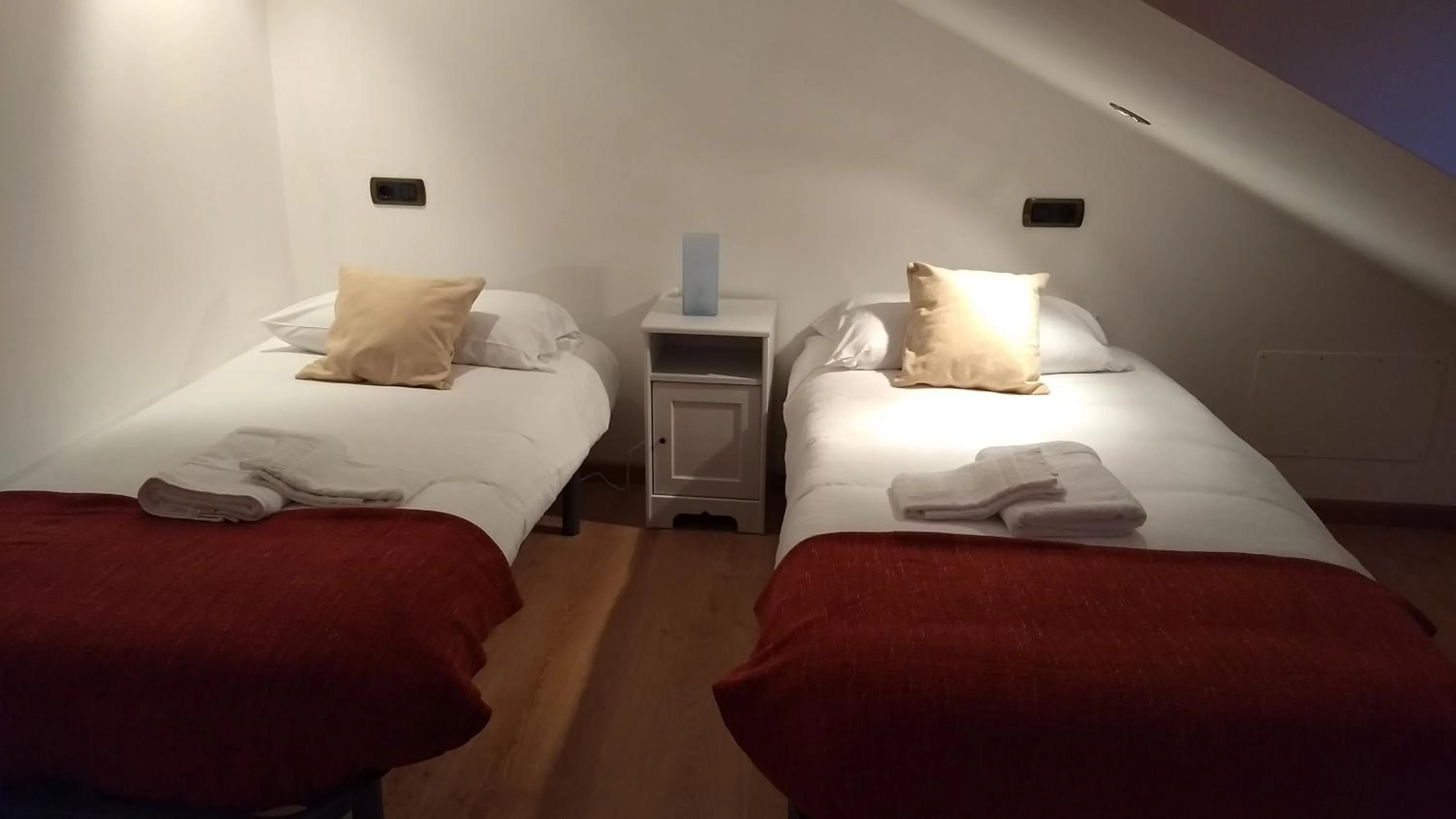 Bed in Apartamentos O Almacen