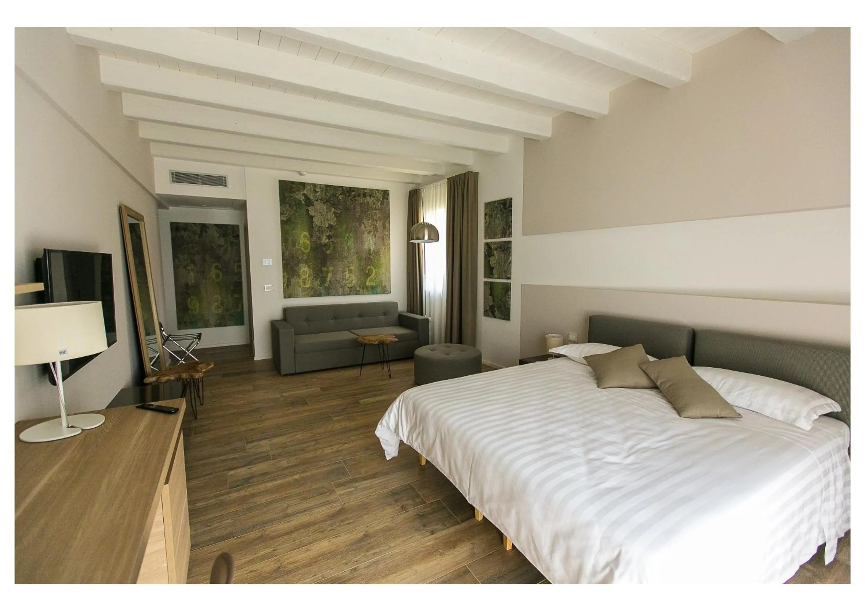 Photo of the whole room, Bed in Ca' Barbini Resort