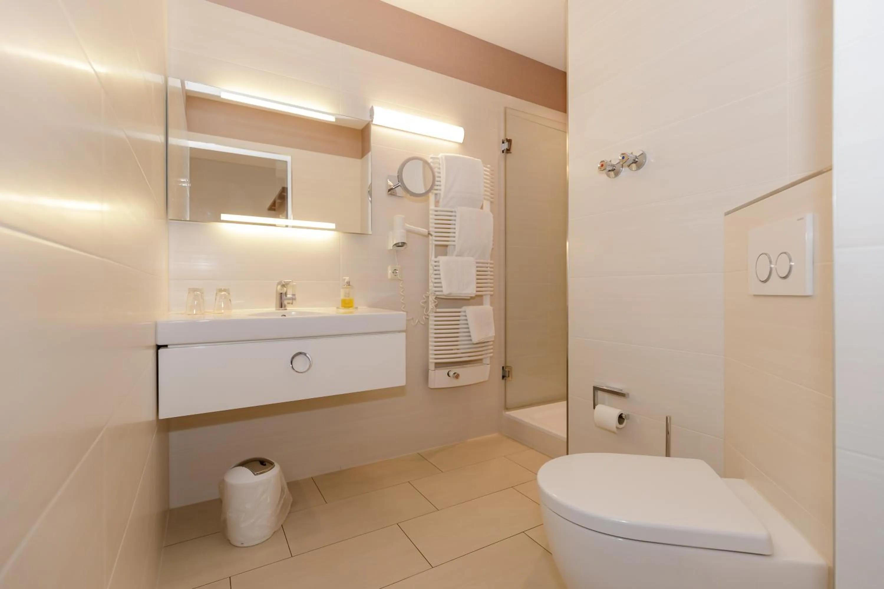 Bathroom in HOTEL am STRAND