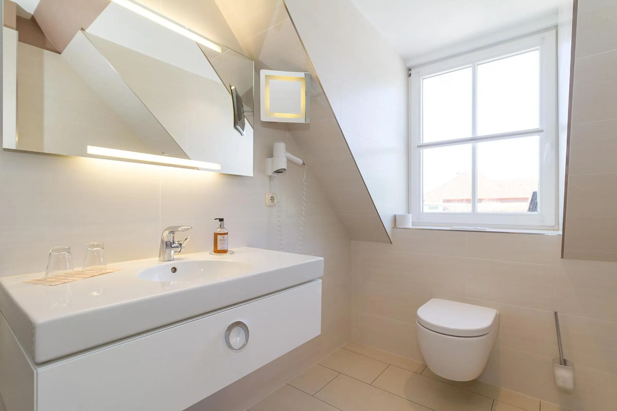 Toilet in HOTEL am STRAND