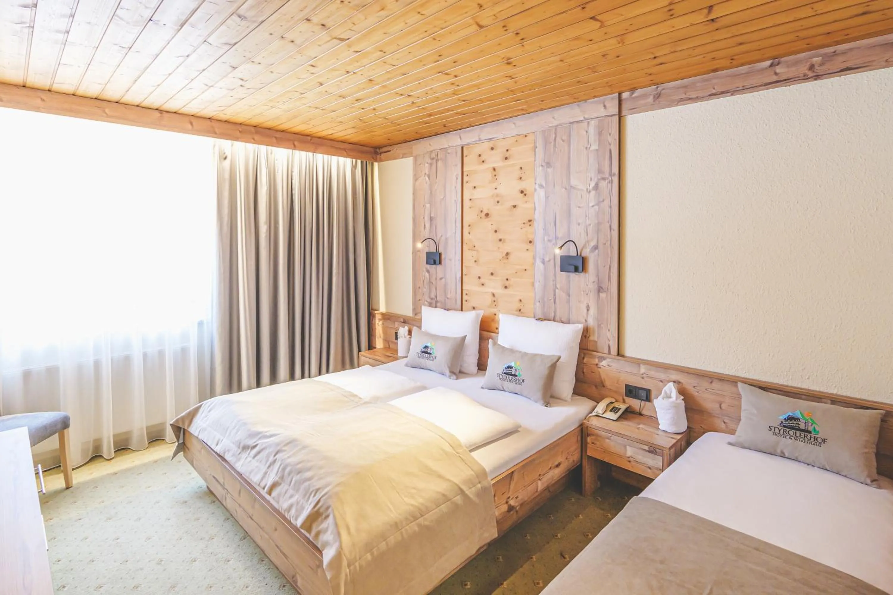 Photo of the whole room, Bed in Hotel Styrolerhof