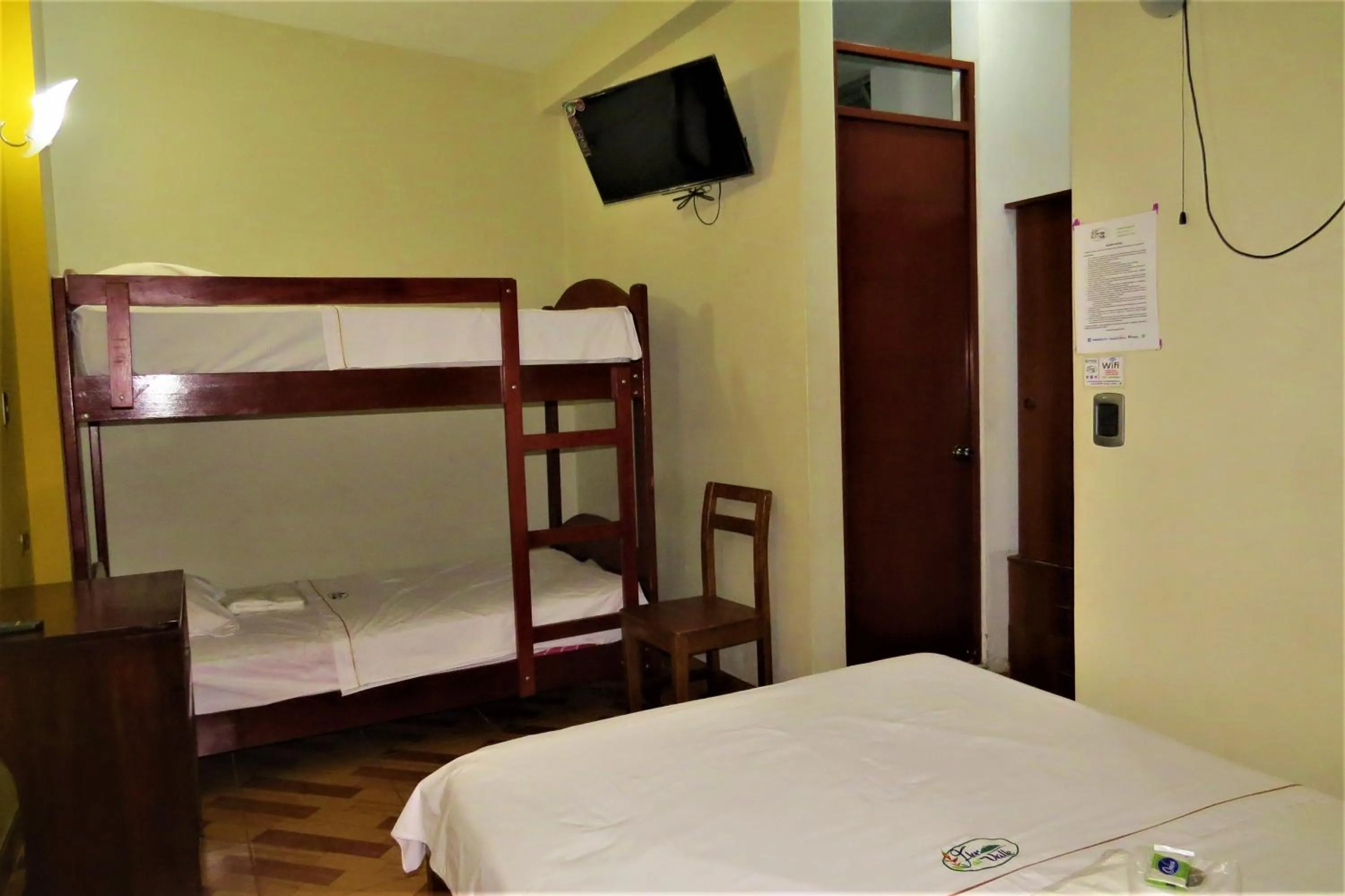 Photo of the whole room, Bed in Flor del Valle Posada