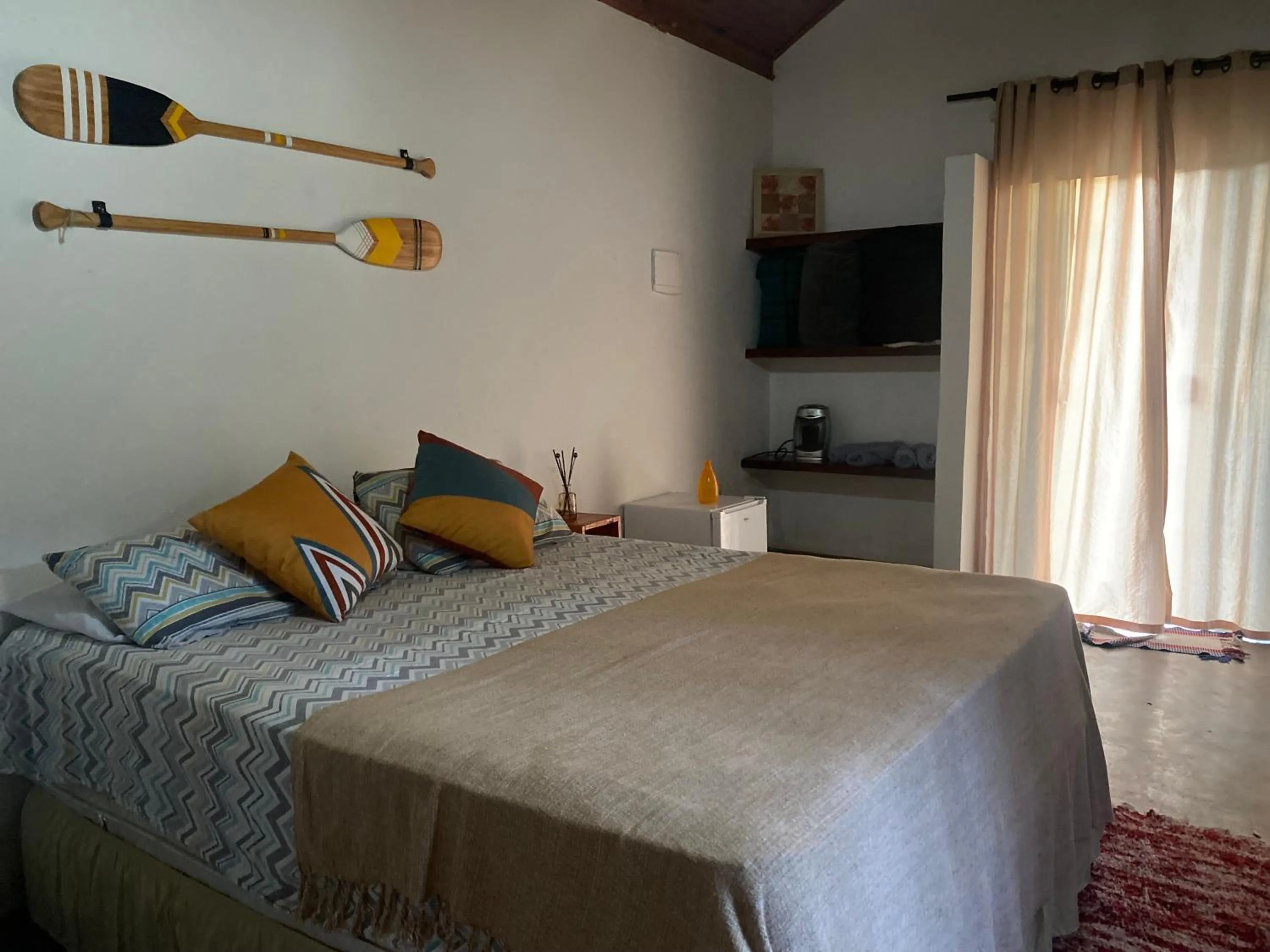 Bed in Pousada Chalés da Lua