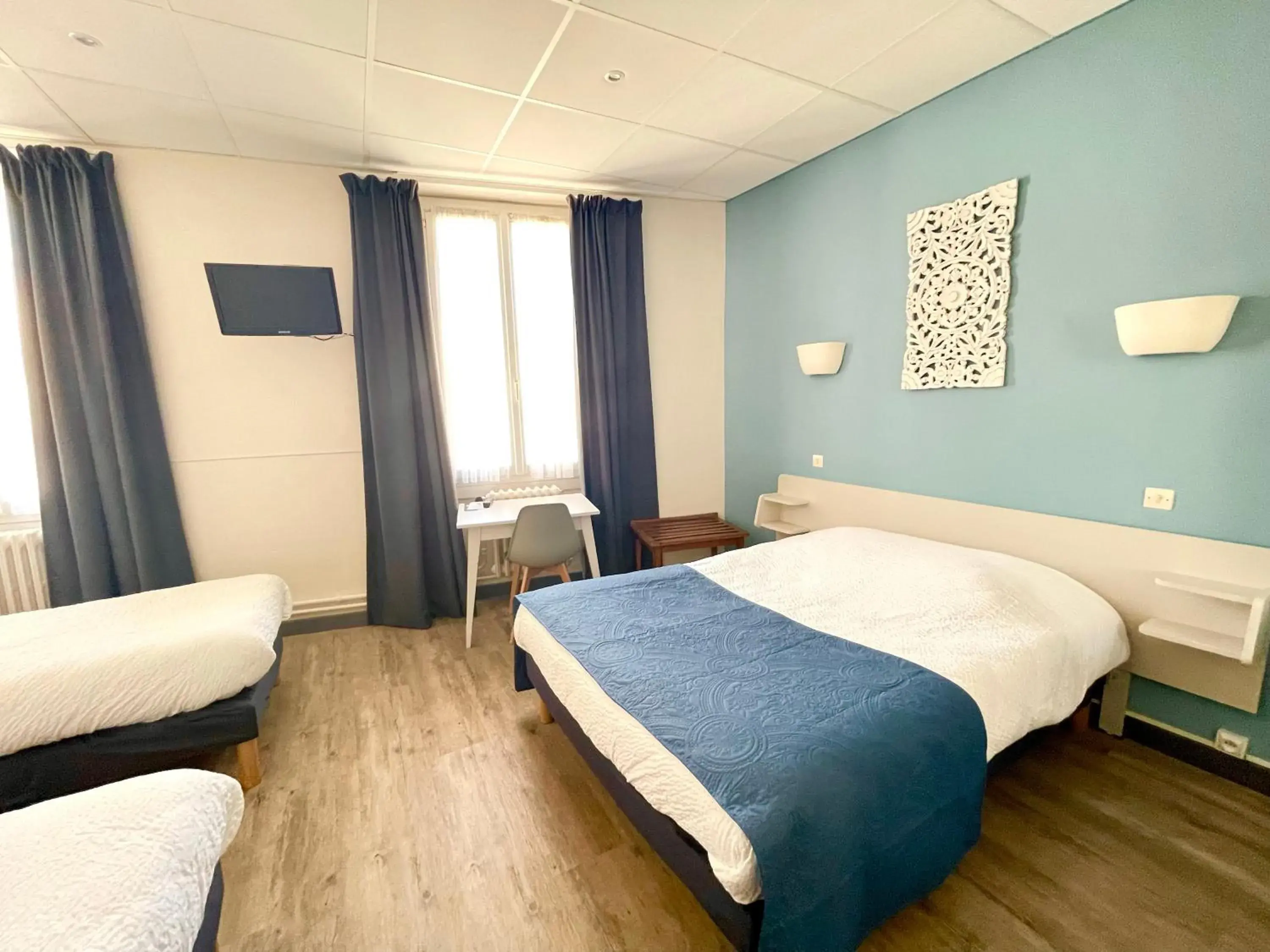 Family Room (2 Adults + 2 Children) in Grand Hôtel De La Poste Family Room (2 Adults + 2 Children) in Grand Hôtel De La Poste