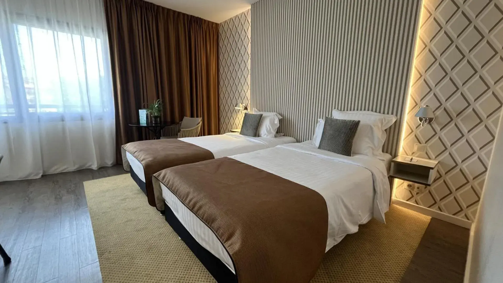 Comfort Twin Room in Aquabella Hôtel & Spa Comfort Twin Room in Aquabella Hôtel & Spa