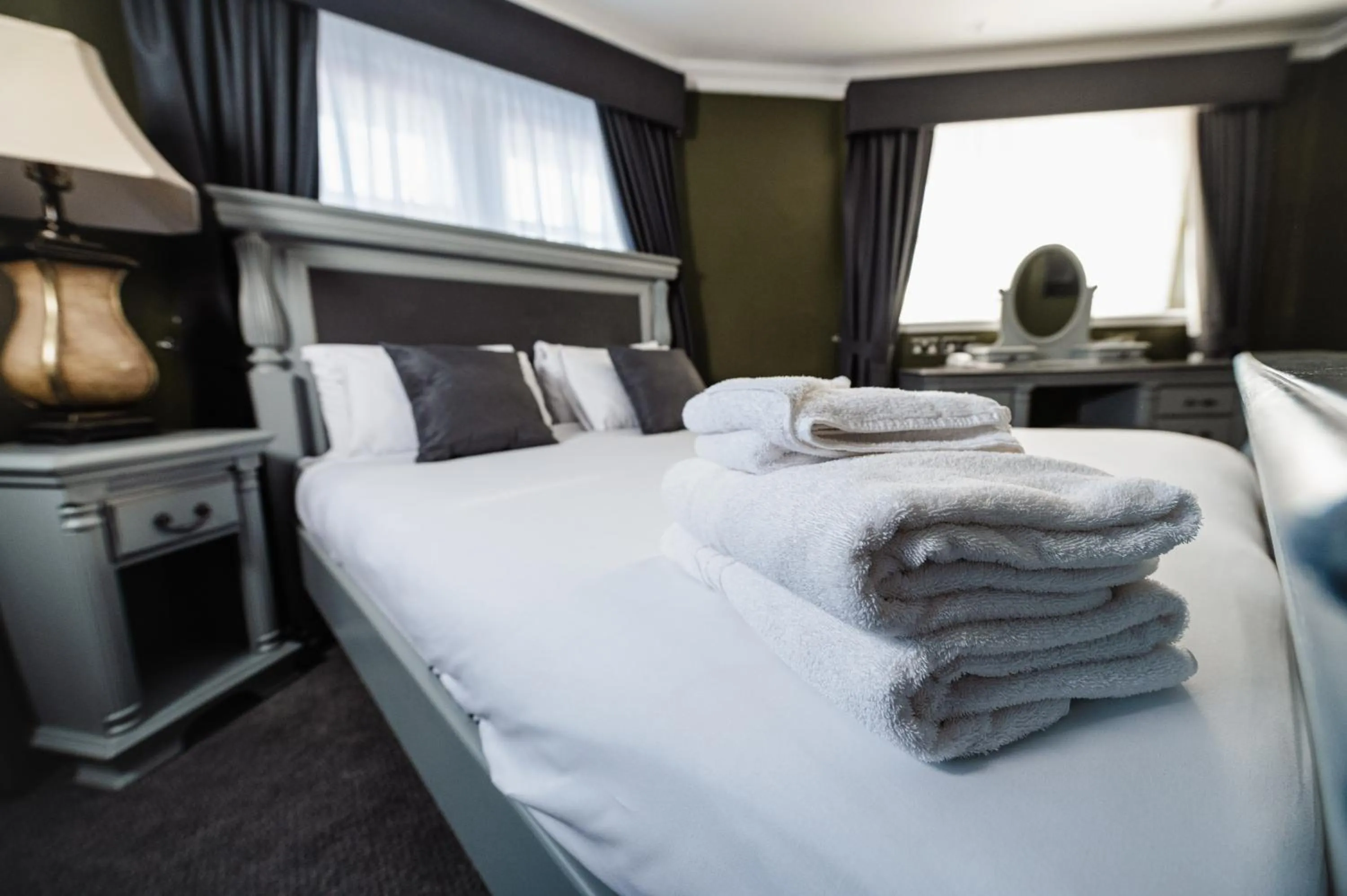 towels, Bed in The Sir Thomas Hotel