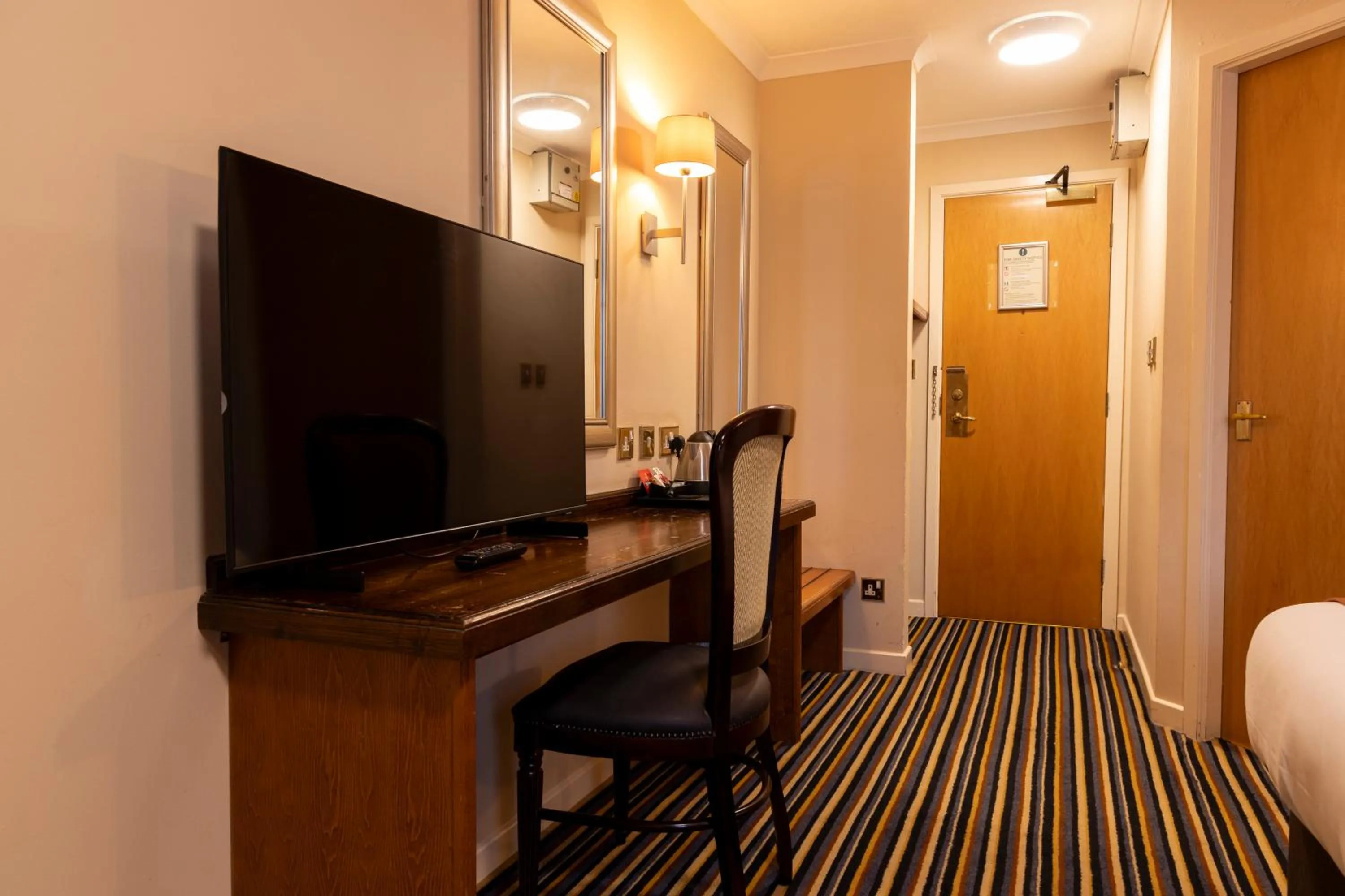 TV and multimedia in Weathervane Hotel by Greene King Inns