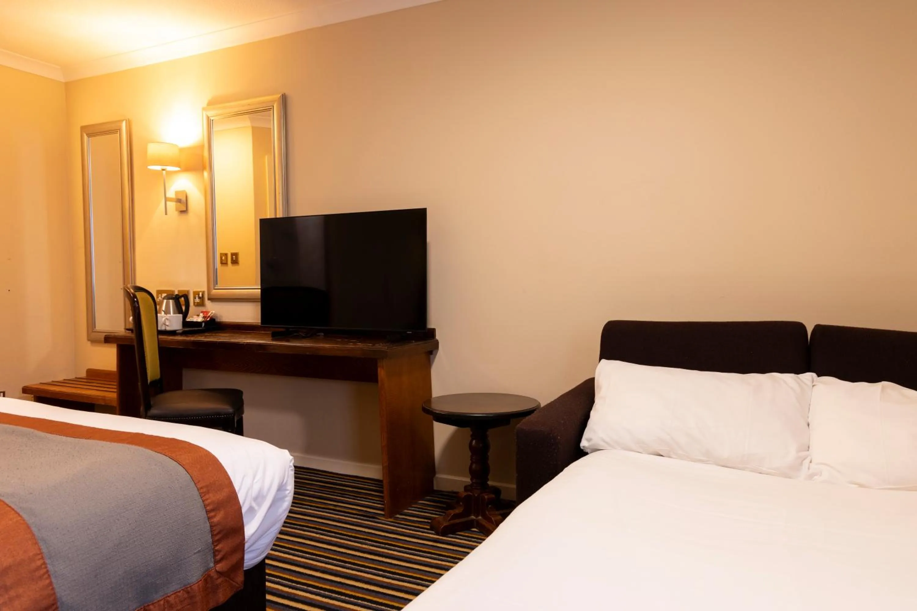 Bed in Weathervane Hotel by Greene King Inns