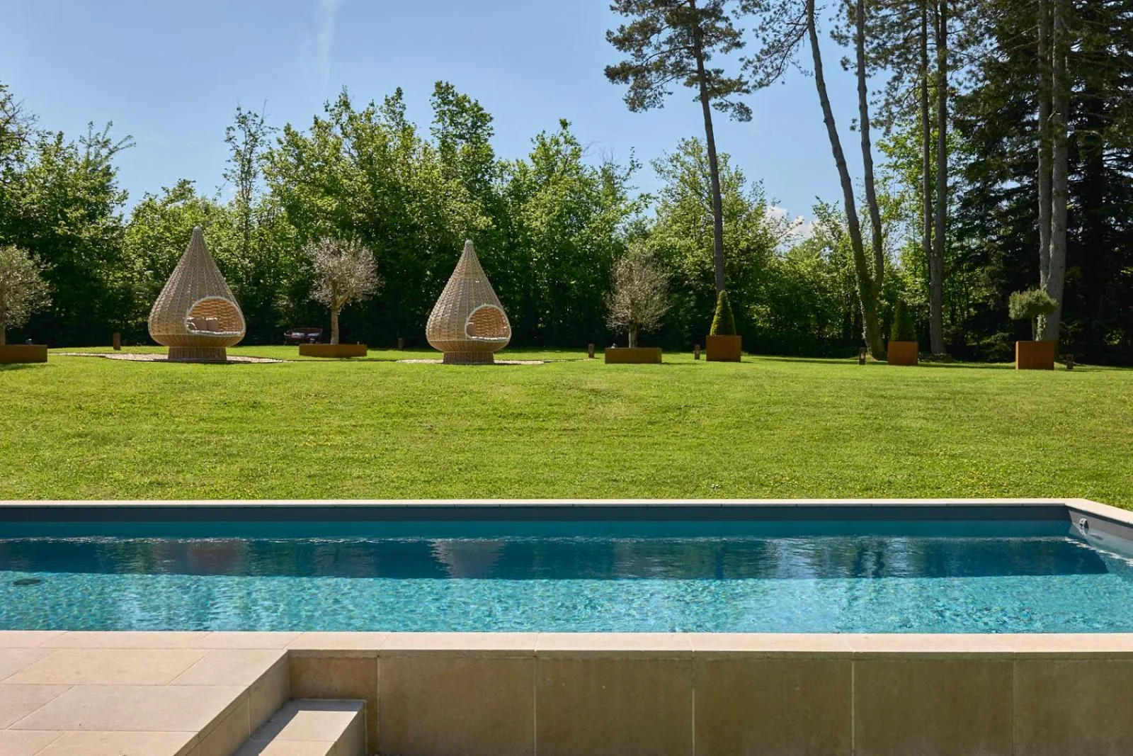 Swimming pool in Maison Zugno Hôtel & Spa