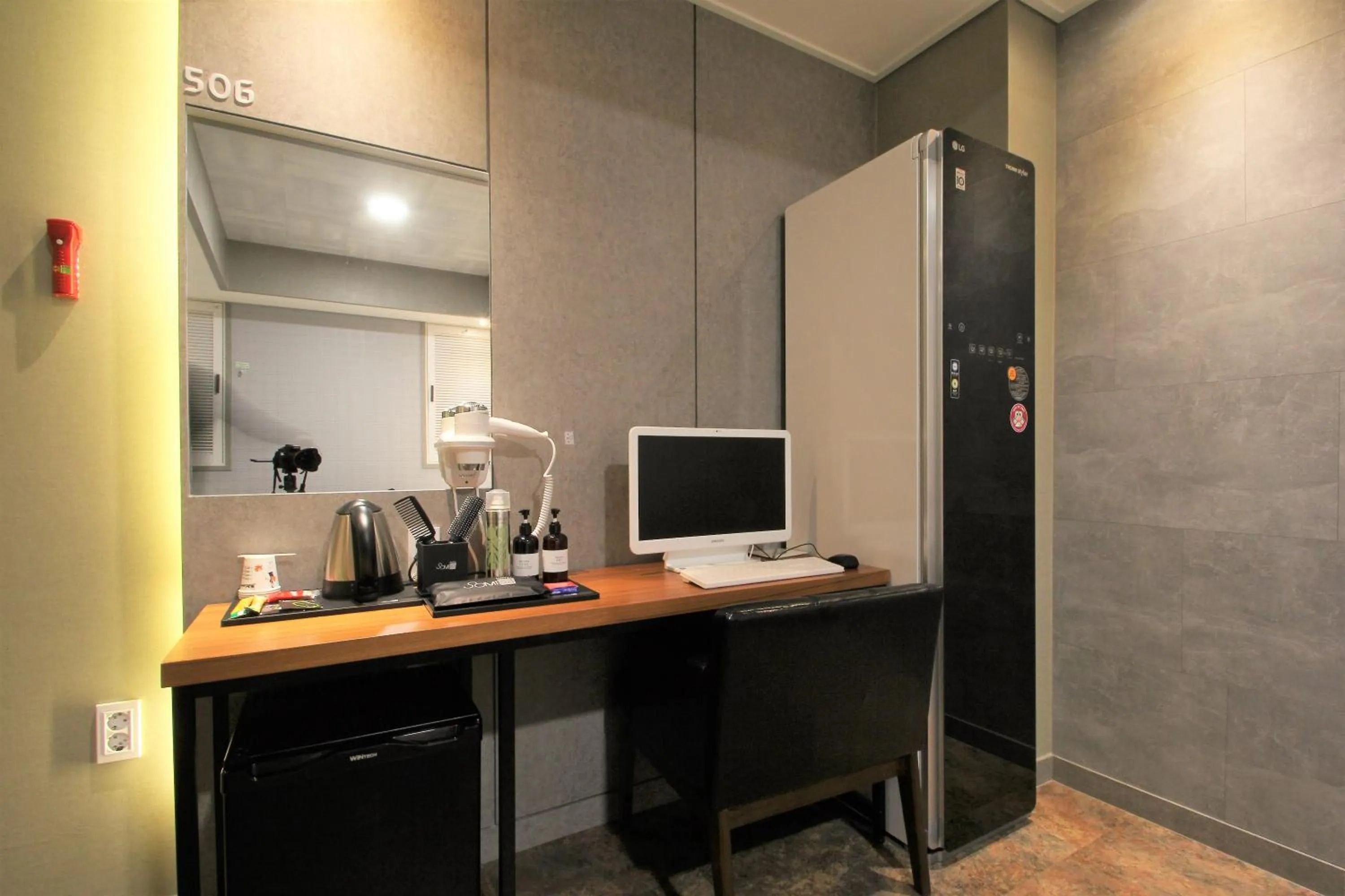 Bedroom, TV/Entertainment Center in Some Hotel