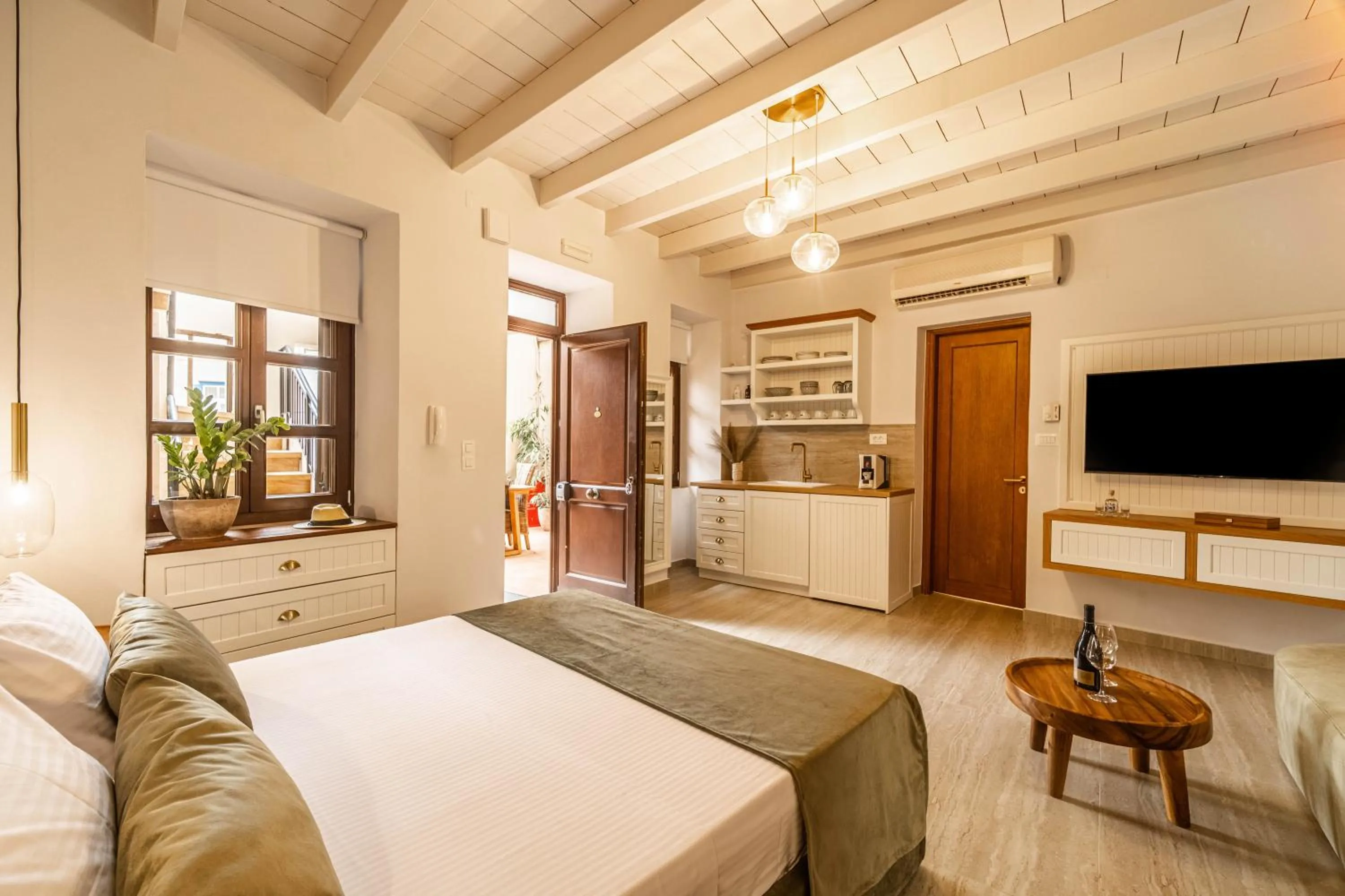 Bed in Lithinon Luxury Suites with Free Parking