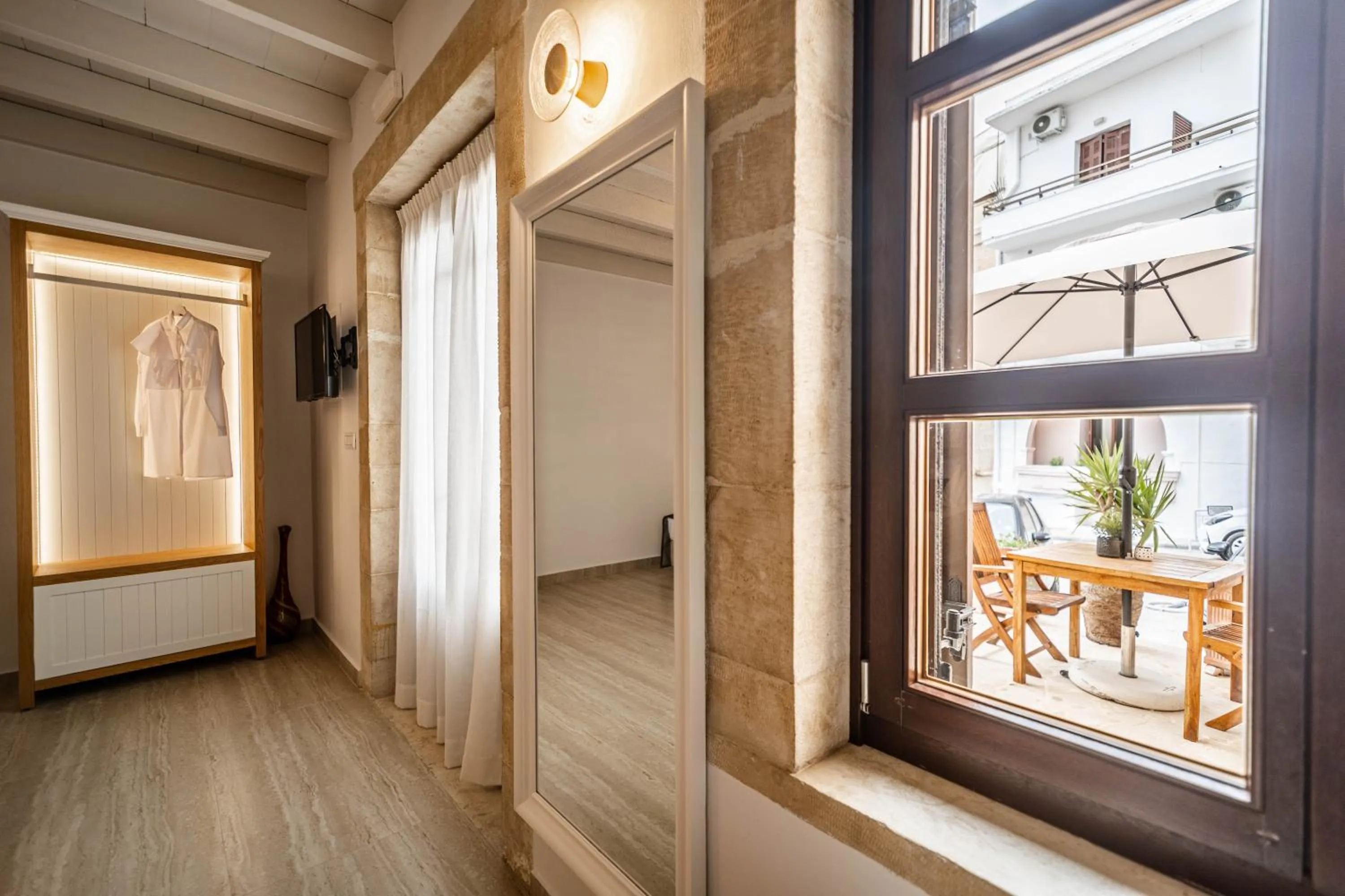 TV and multimedia in Lithinon Luxury Suites with Free Parking