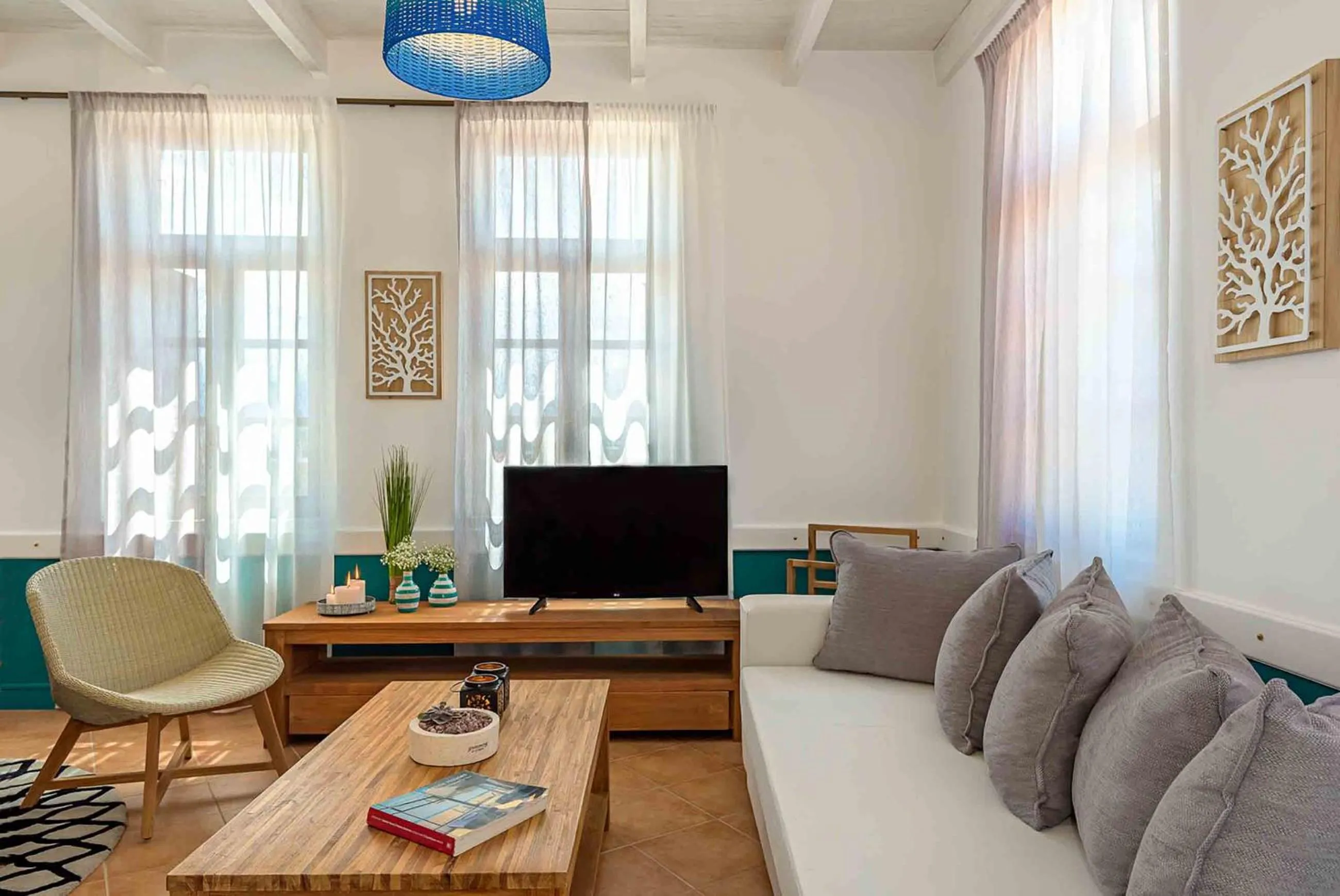 TV and multimedia in Lithinon Luxury Suites with Free Parking