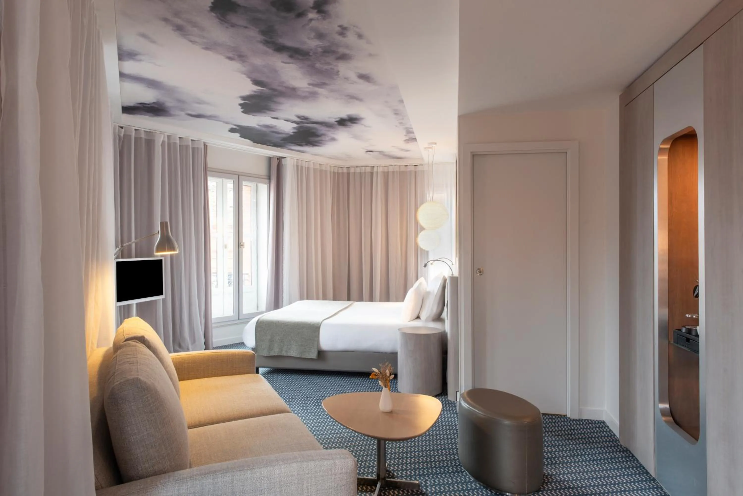 Bedroom, Bed in Le Grand Balcon Hotel