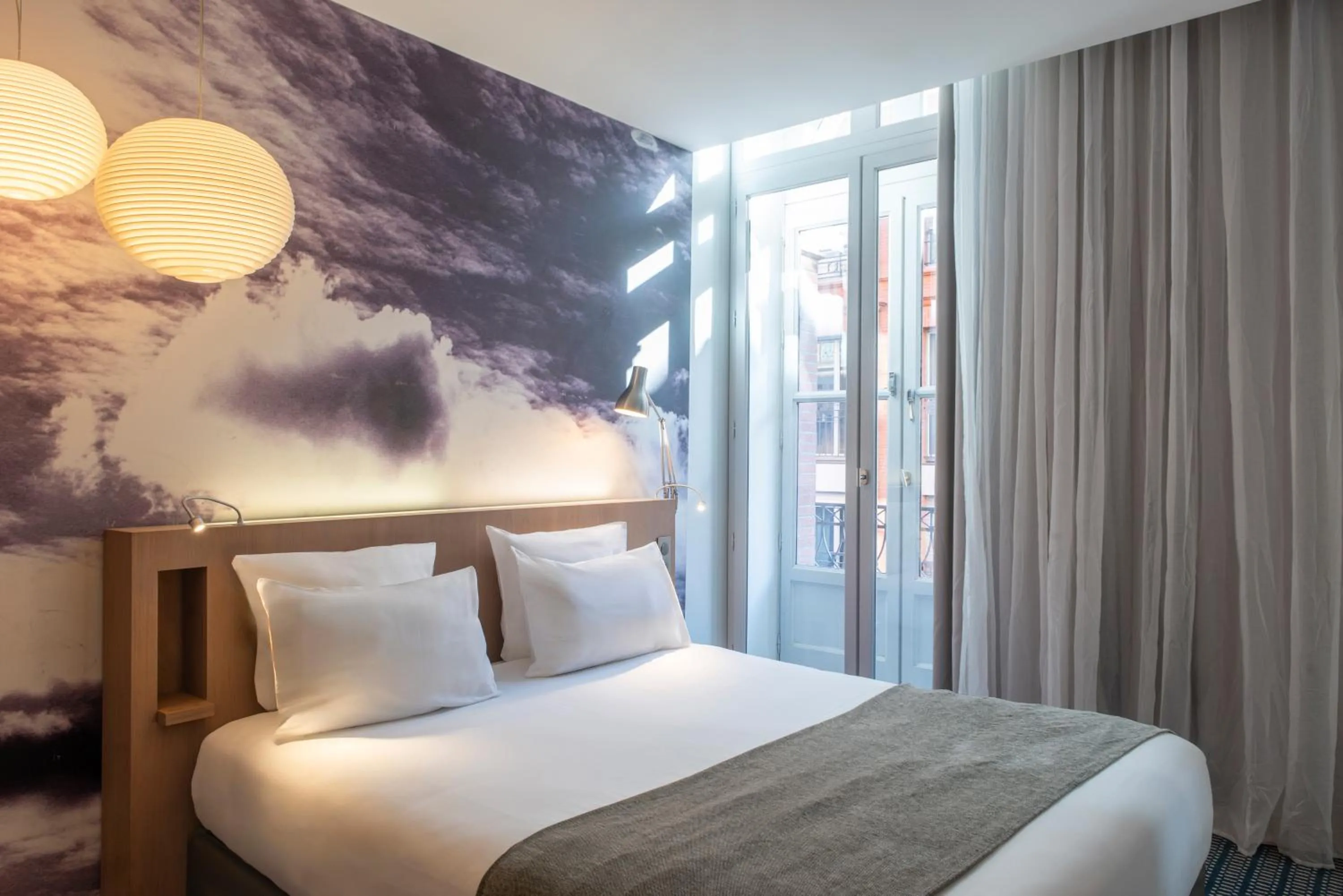 Bedroom, Bed in Le Grand Balcon Hotel