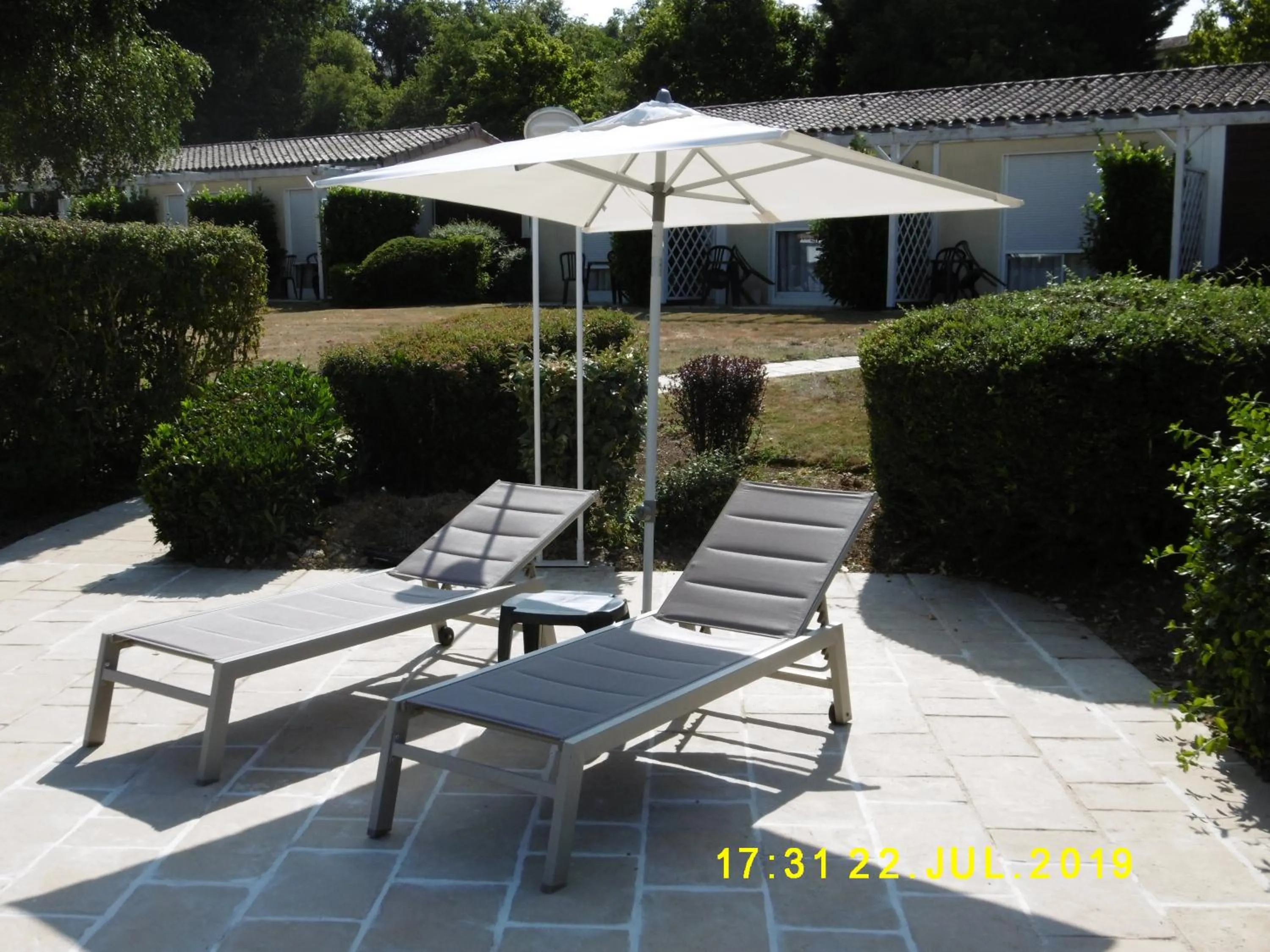 Patio in Logis Hôtel Val de Vienne