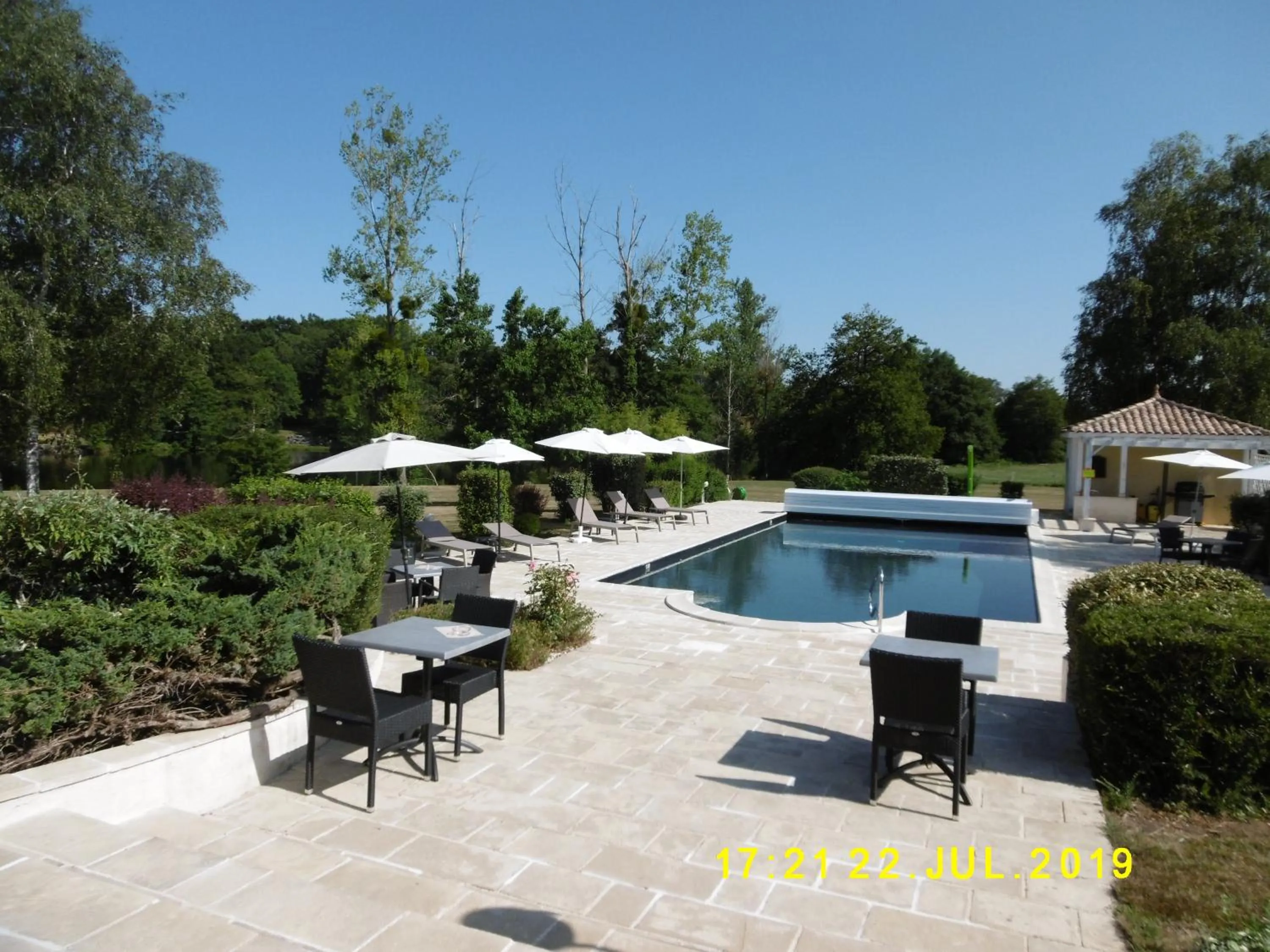 Pool view in Logis Hôtel Val de Vienne