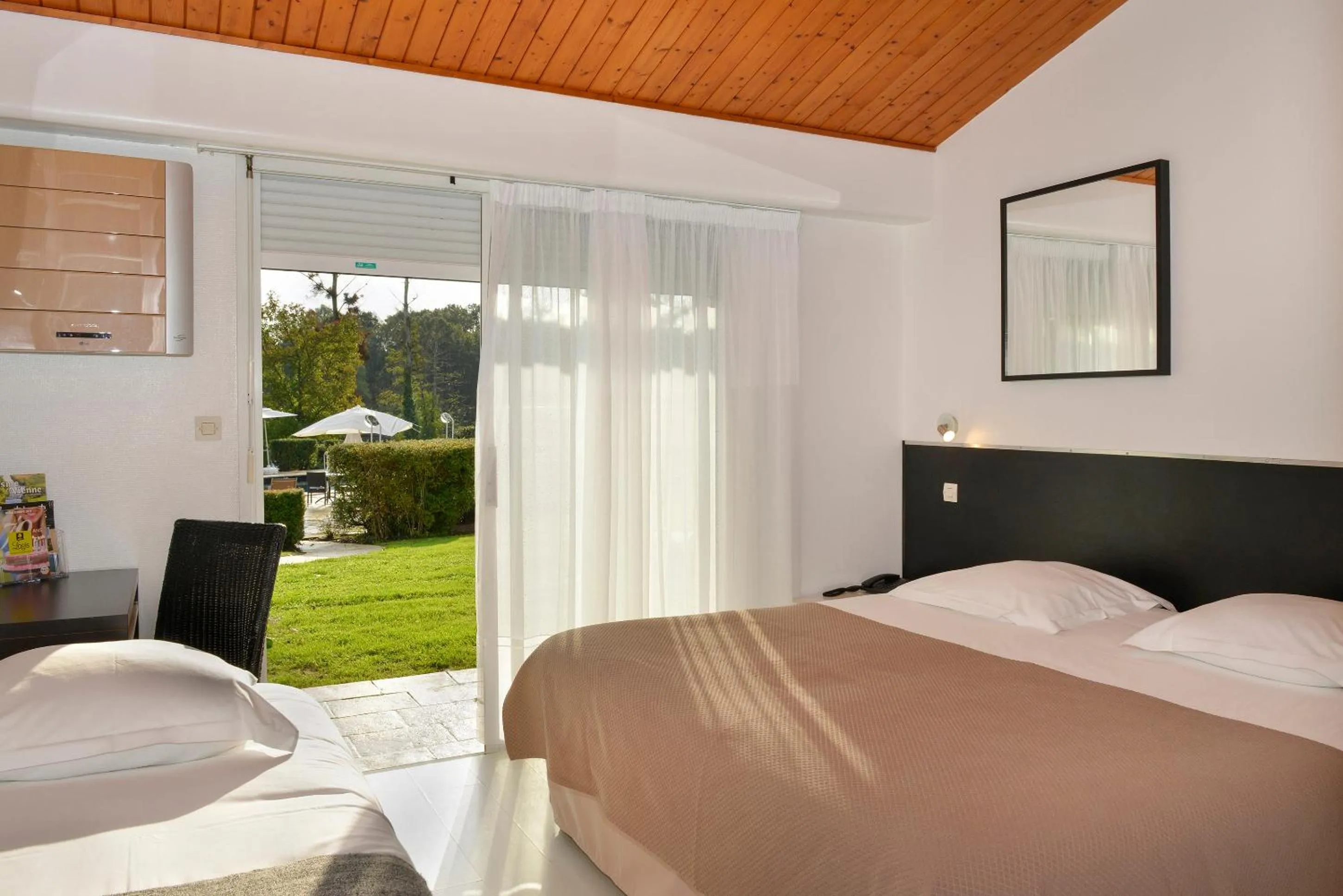 Photo of the whole room, Bed in Logis Hôtel Val de Vienne