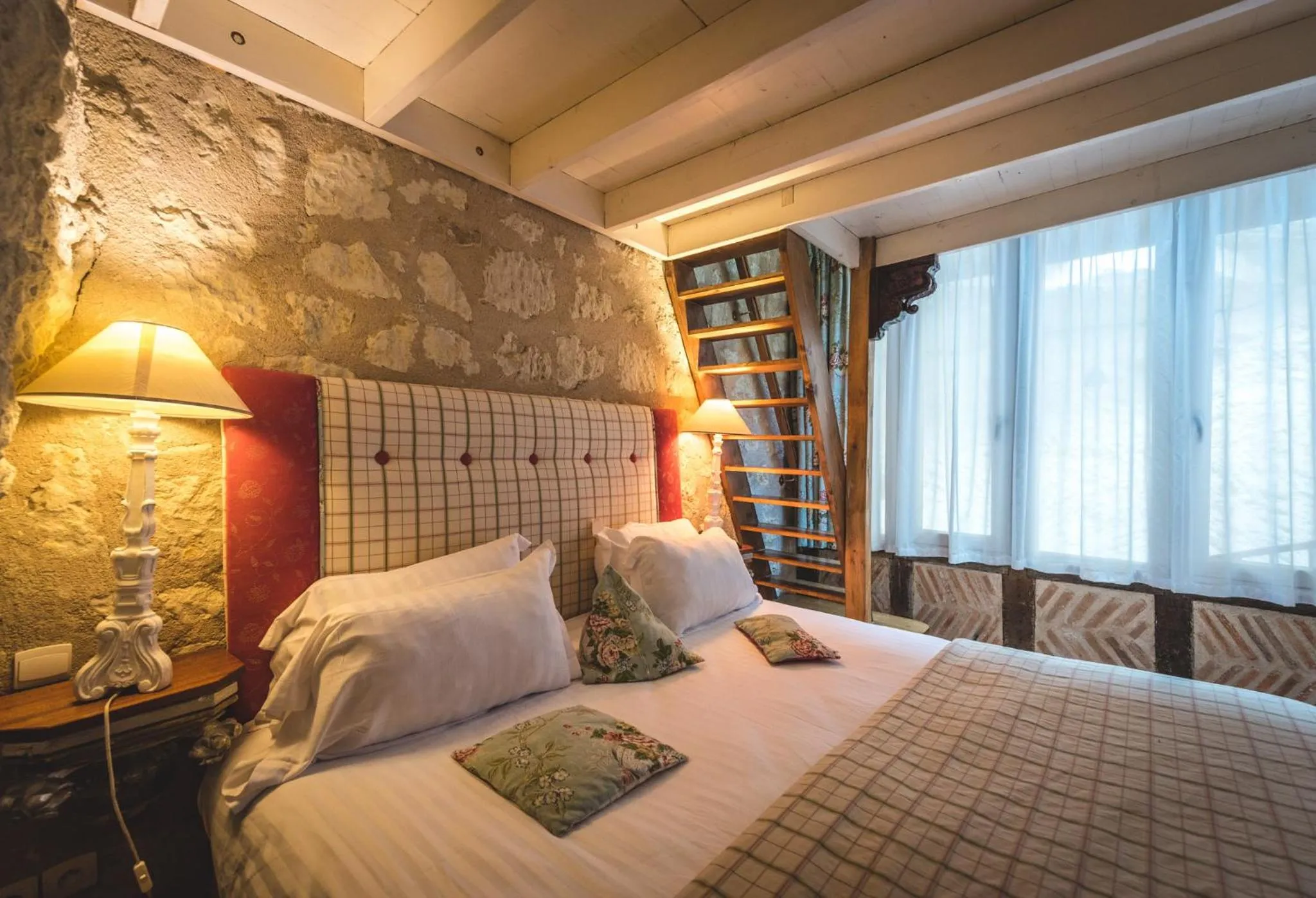 Bed in Logis Demeure de la Vignole